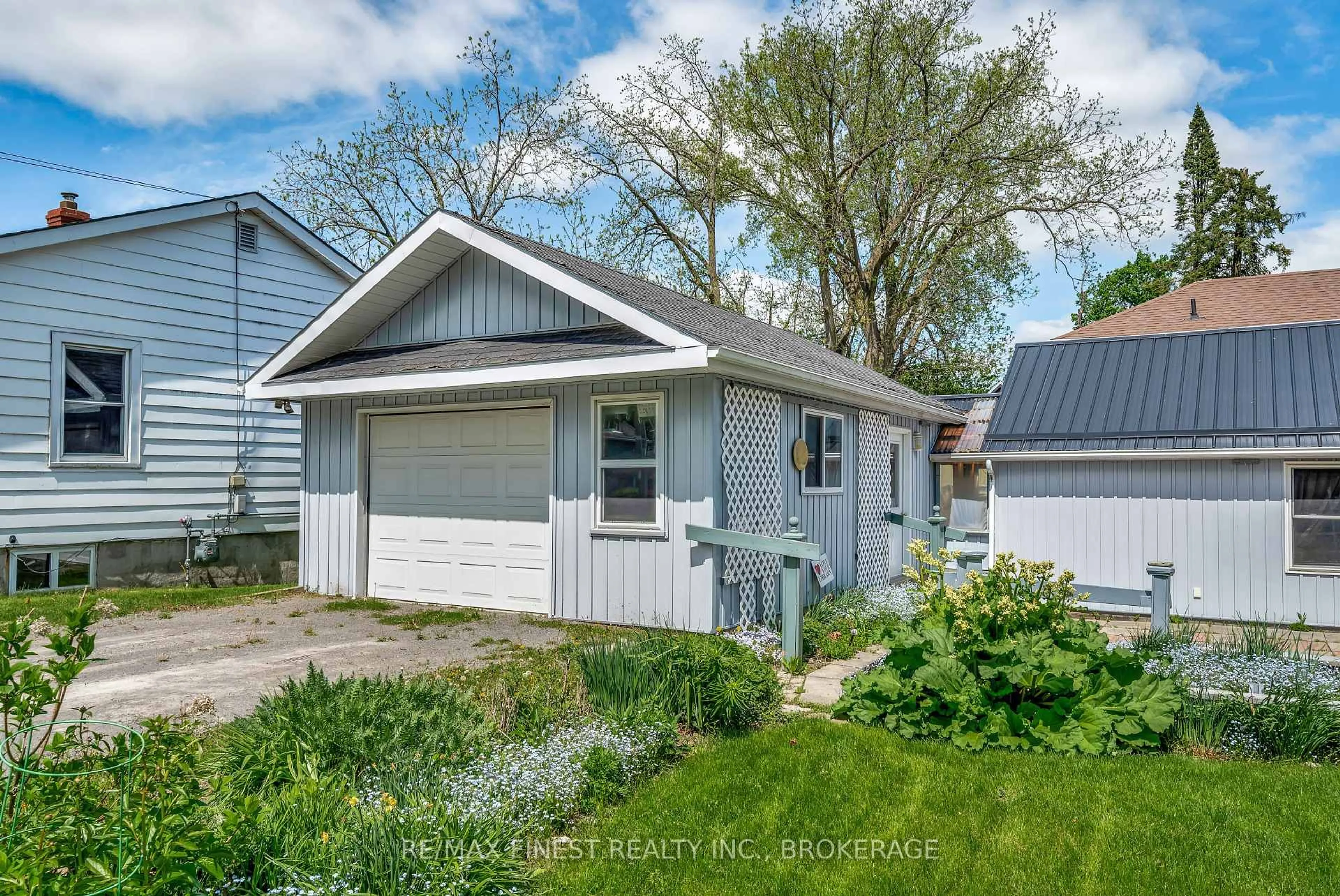 Home with vinyl exterior material, street for 8 Catherine St, Prince Edward County Ontario K0K 2T0