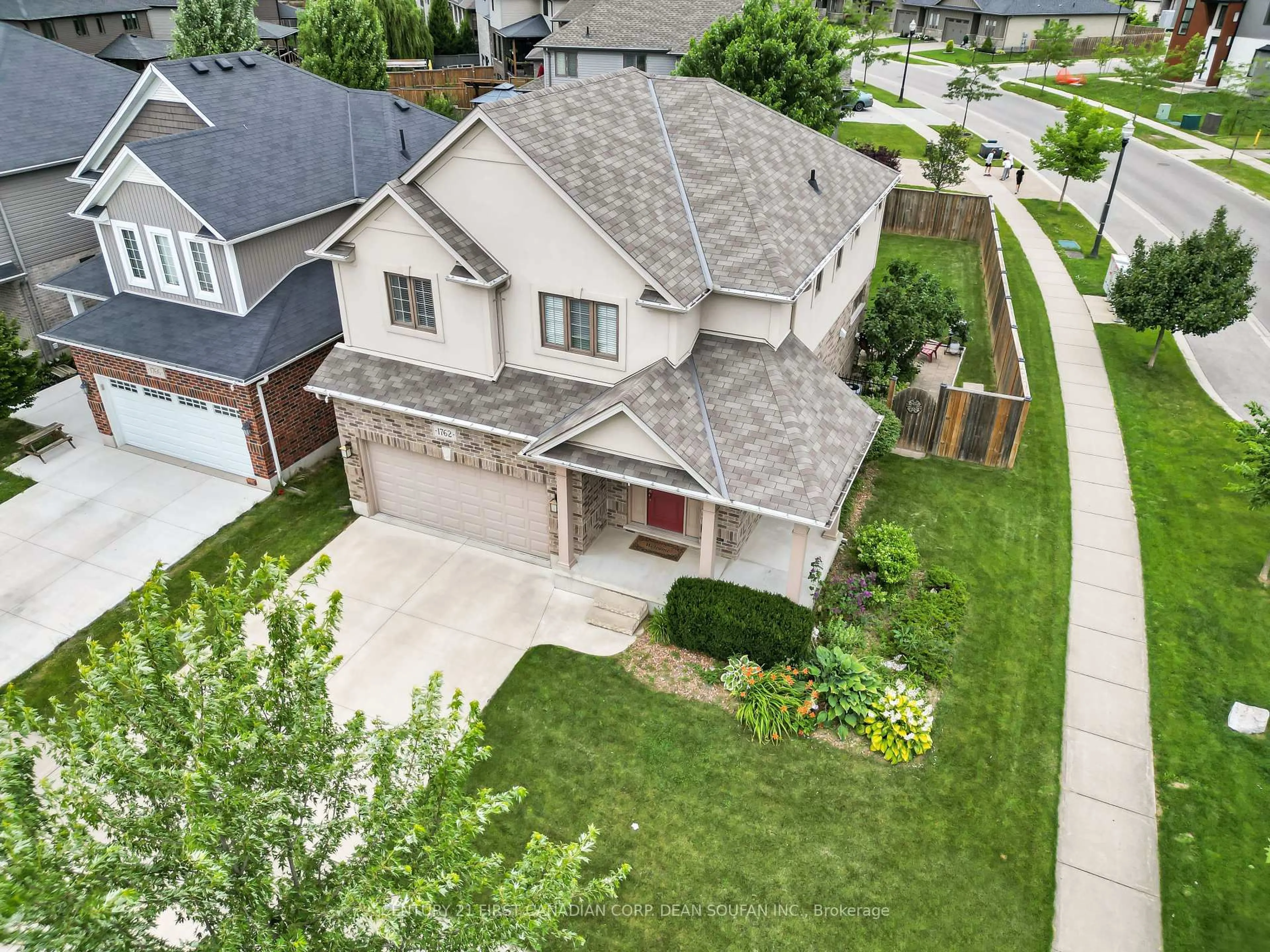 A pic from outside/outdoor area/front of a property/back of a property/a pic from drone, street for 1762 Waterwheel Lane, London North Ontario N5X 0J4