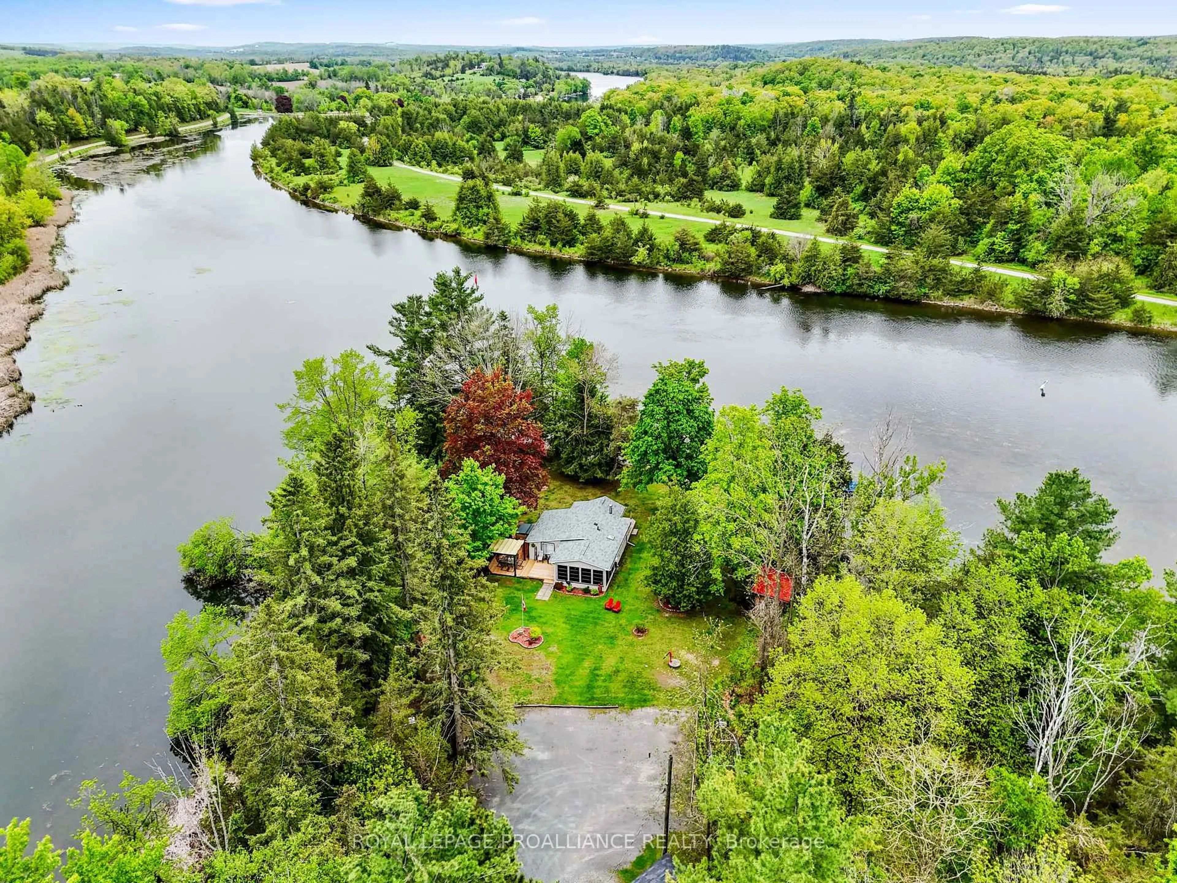 A pic from outside/outdoor area/front of a property/back of a property/a pic from drone, water/lake/river/ocean view for 249 4th Line #A, Trent Hills Ontario K0L 1L0