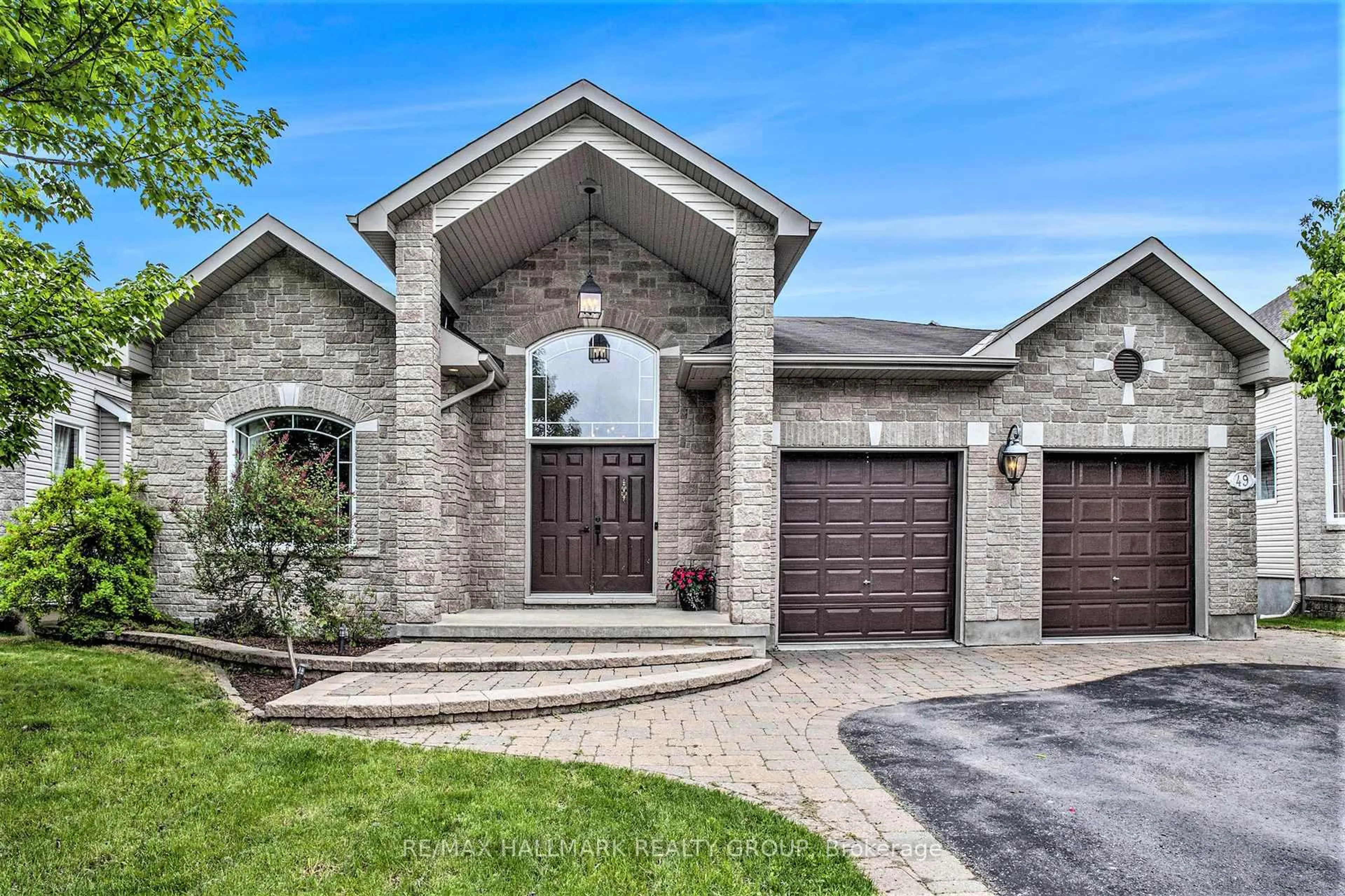 Home with brick exterior material, street for 49 De La Rive Prom, Russell Ontario K0A 1W0