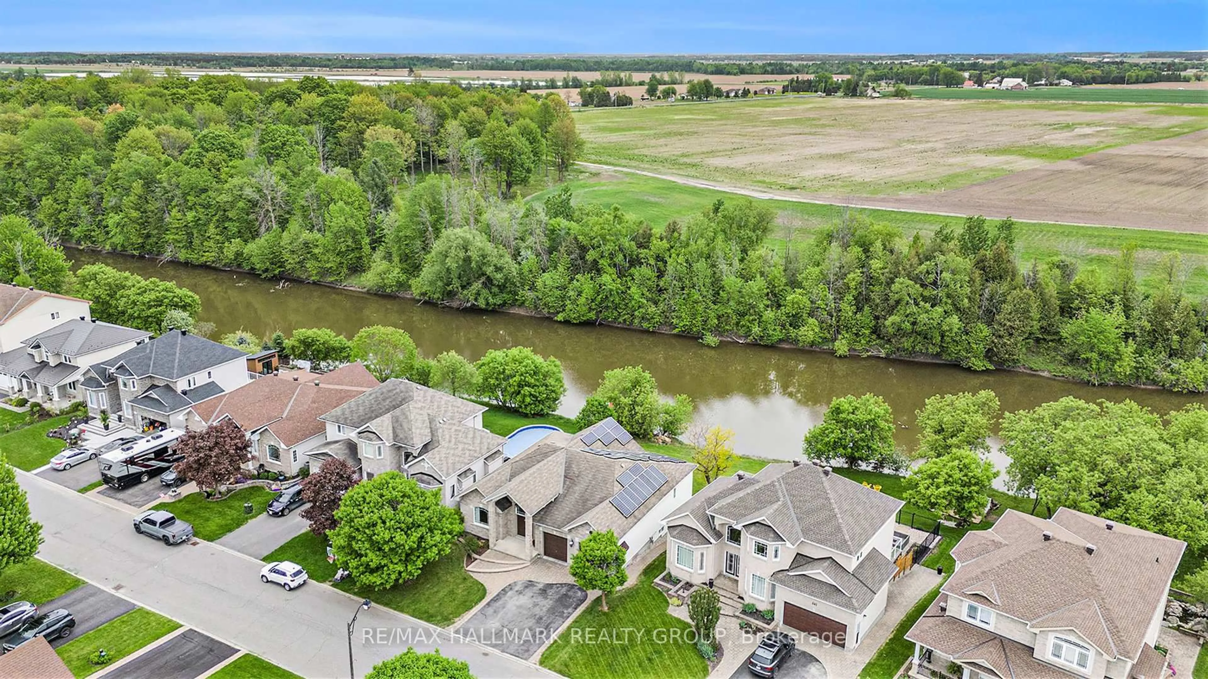 A pic from outside/outdoor area/front of a property/back of a property/a pic from drone, water/lake/river/ocean view for 49 De La Rive Prom, Russell Ontario K0A 1W0