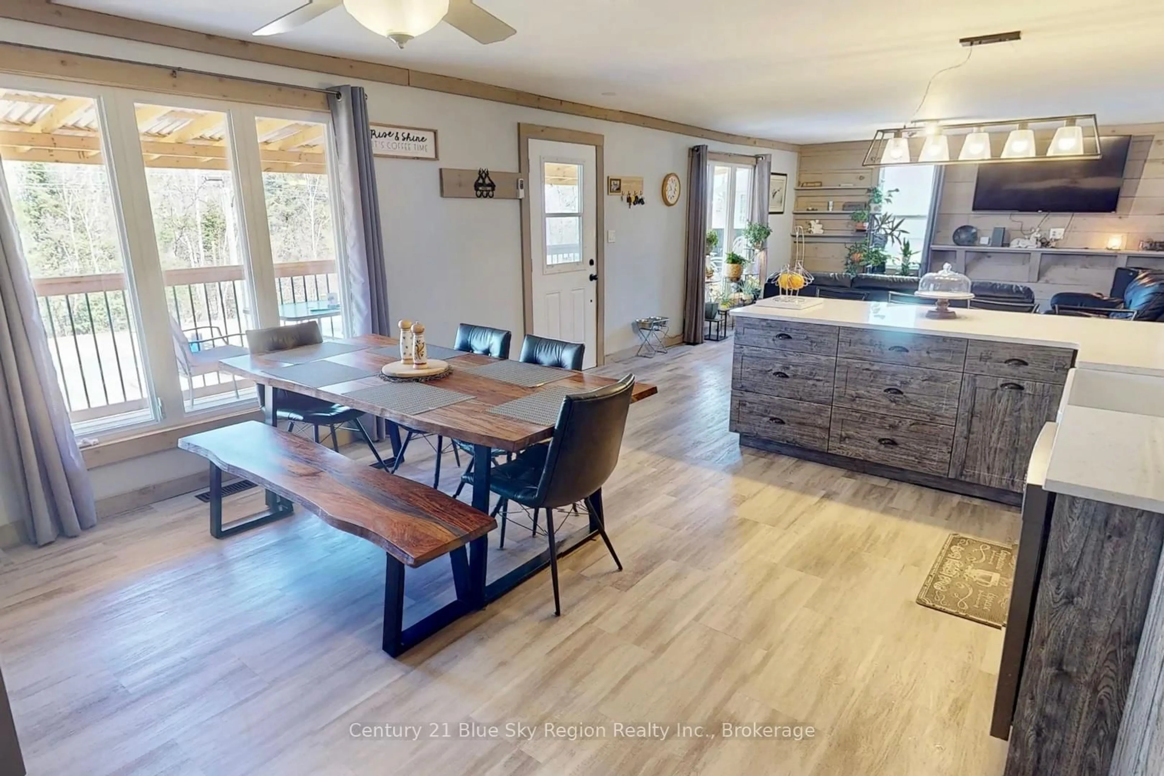Open concept kitchen, wood/laminate floor for 17 Cameron St, Burk's Falls Ontario P0A 1C0