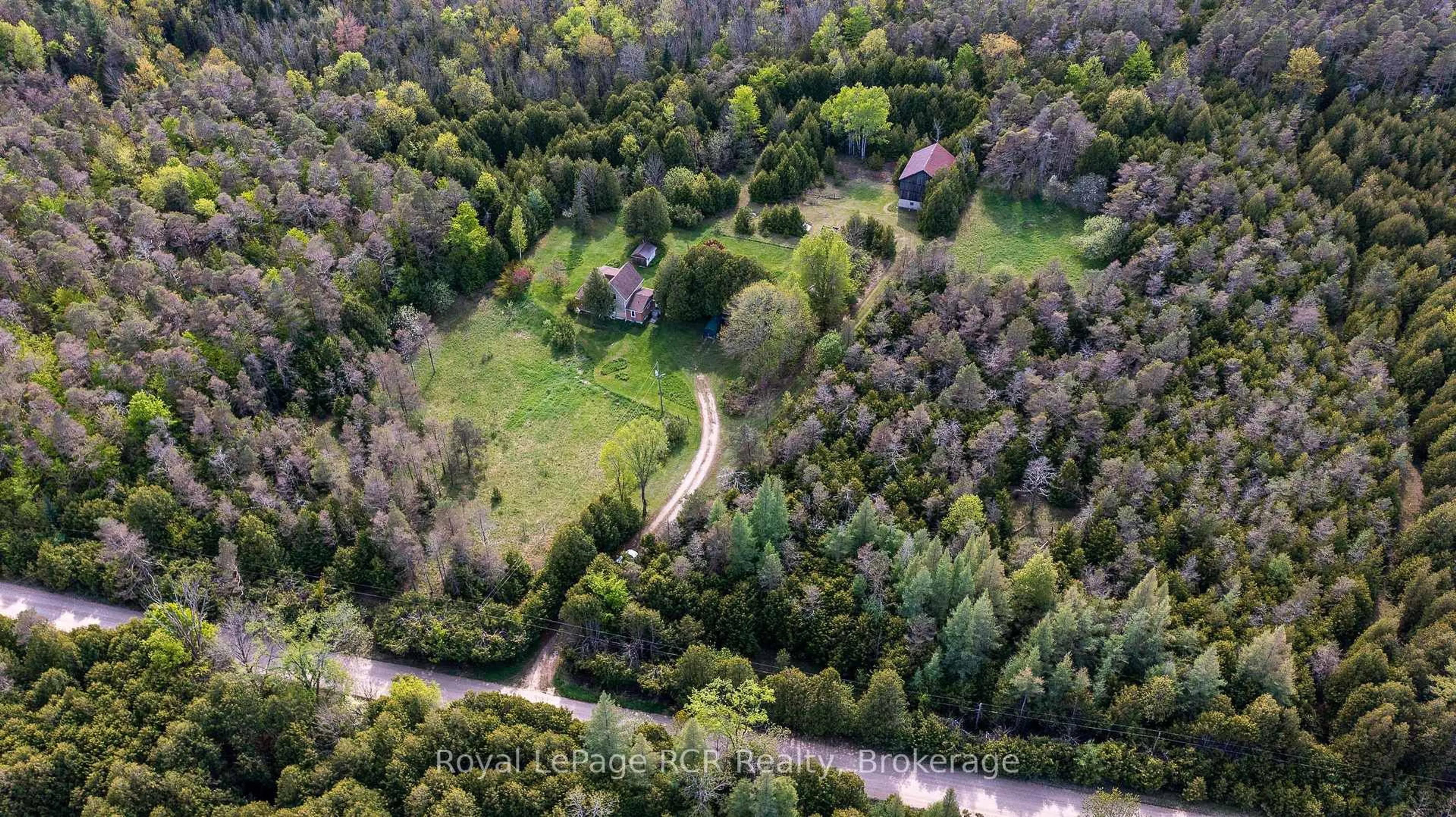A pic from outside/outdoor area/front of a property/back of a property/a pic from drone, forest/trees view for 134780 20 Sdrd, West Grey Ontario N0G 1L0