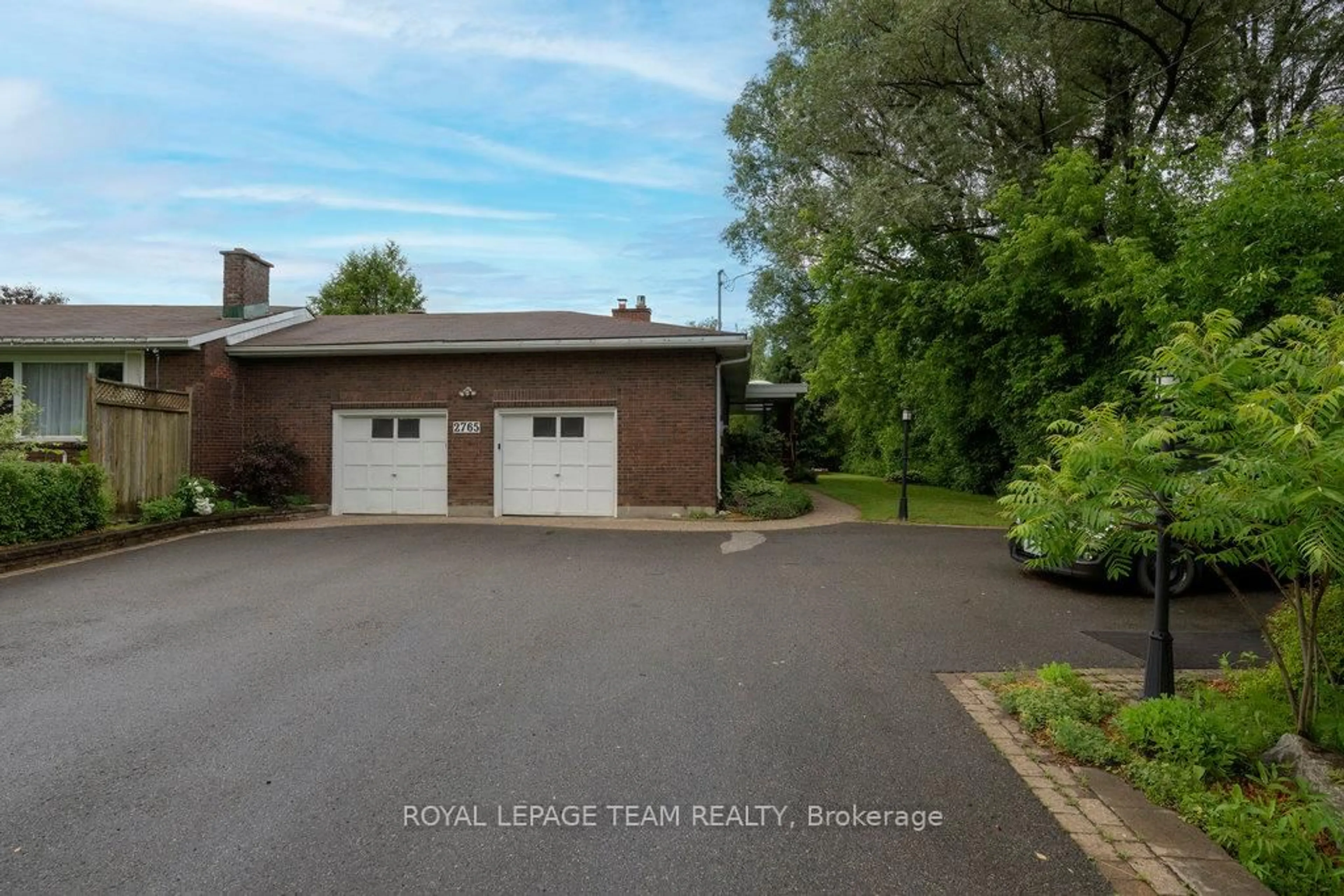 A pic from outside/outdoor area/front of a property/back of a property/a pic from drone, water/lake/river/ocean view for 2765 Quinn Rd, Ottawa Ontario K1T 3V4
