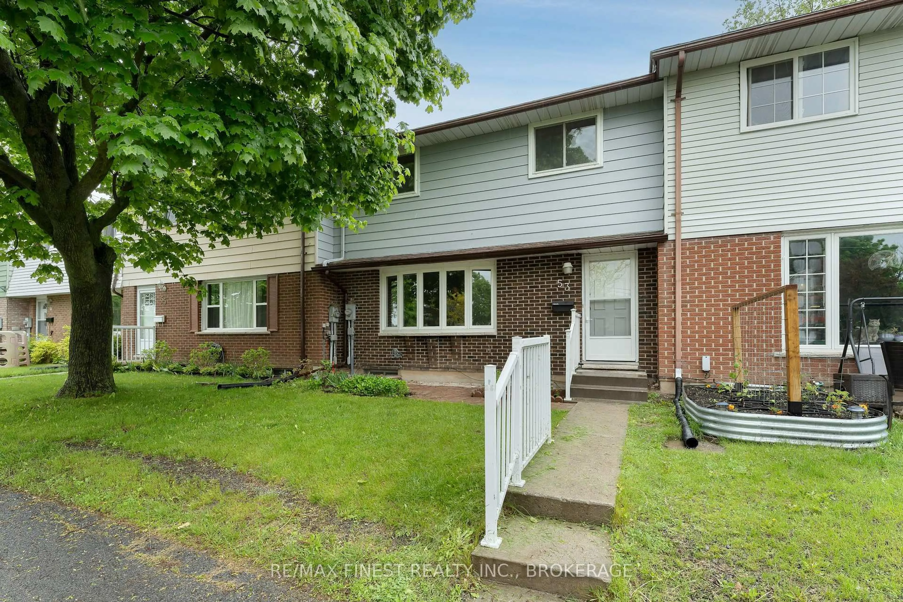 A pic from outside/outdoor area/front of a property/back of a property/a pic from drone, street for 53 Winchester Dr #27, Greater Napanee Ontario K7R 3P9