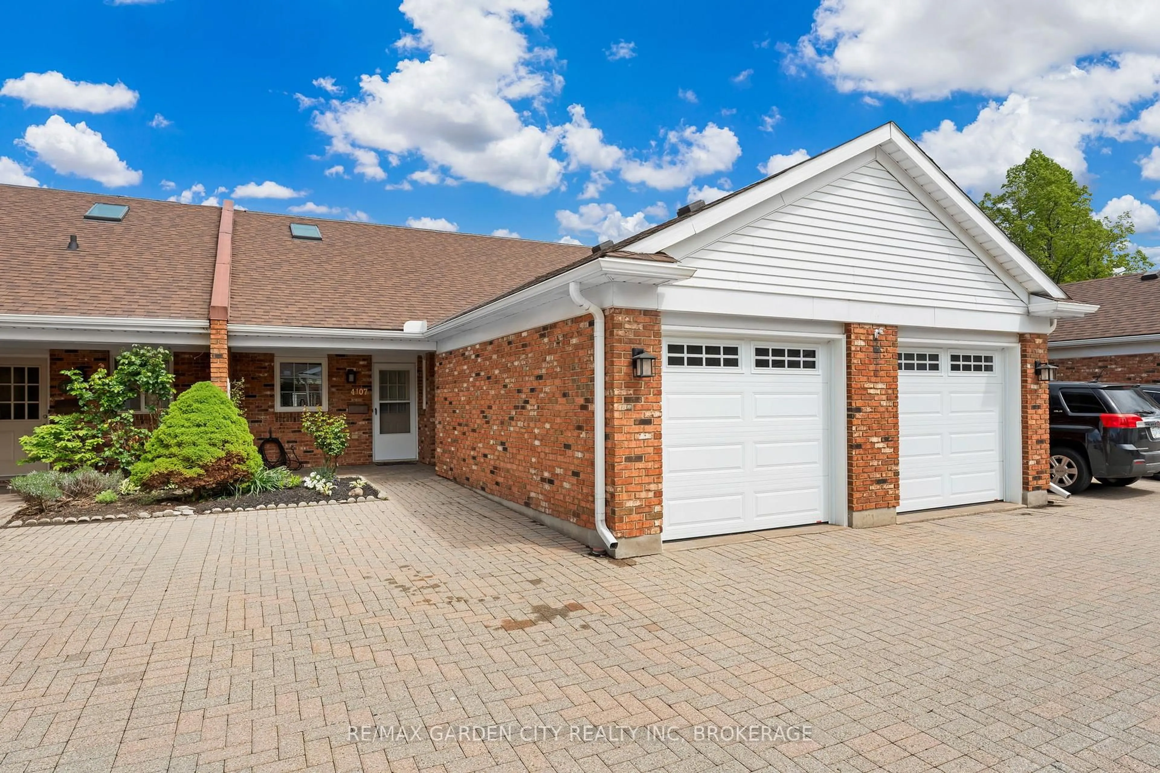 Home with brick exterior material, street for 4107 Cherry Blossom Lane, Lincoln Ontario L0R 2C0