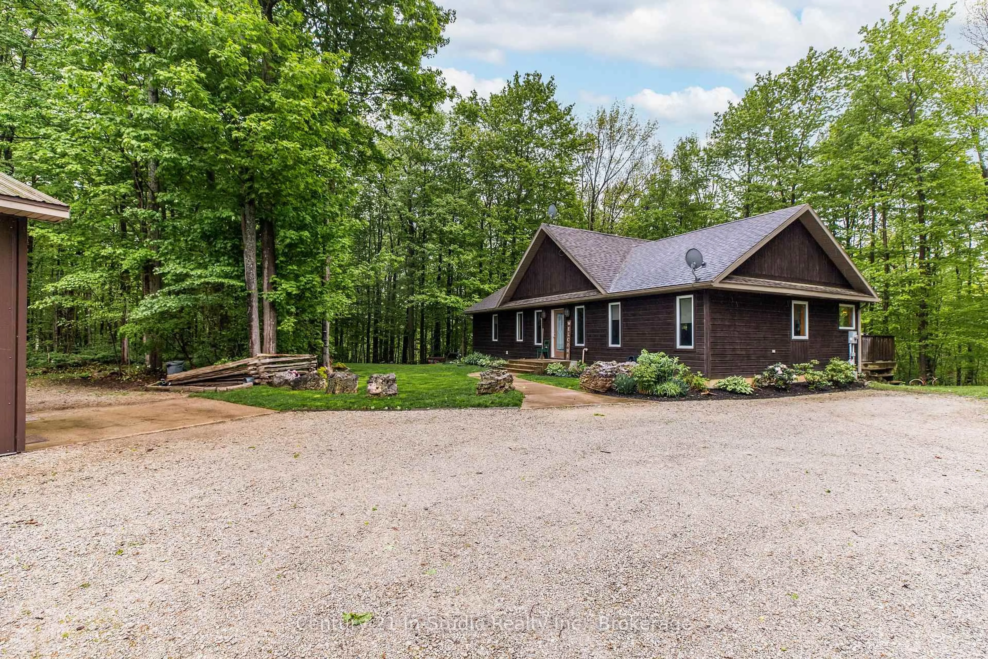 A pic from outside/outdoor area/front of a property/back of a property/a pic from drone, unknown for 019249 6 Highway, Georgian Bluffs Ontario N0H 2T0