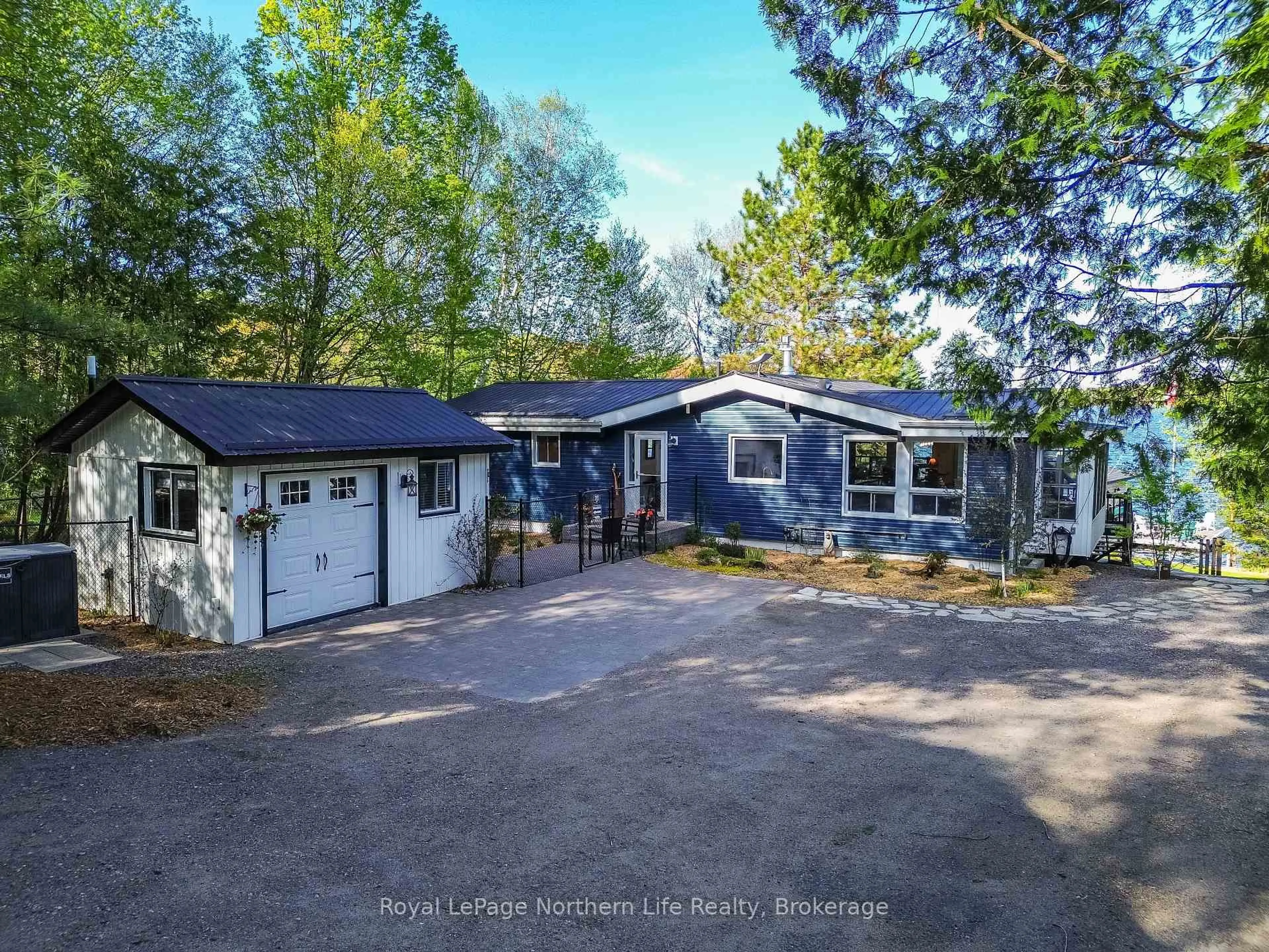 A pic from outside/outdoor area/front of a property/back of a property/a pic from drone, street for 84 Kyle Rd, East Ferris Ontario P0H 1K0