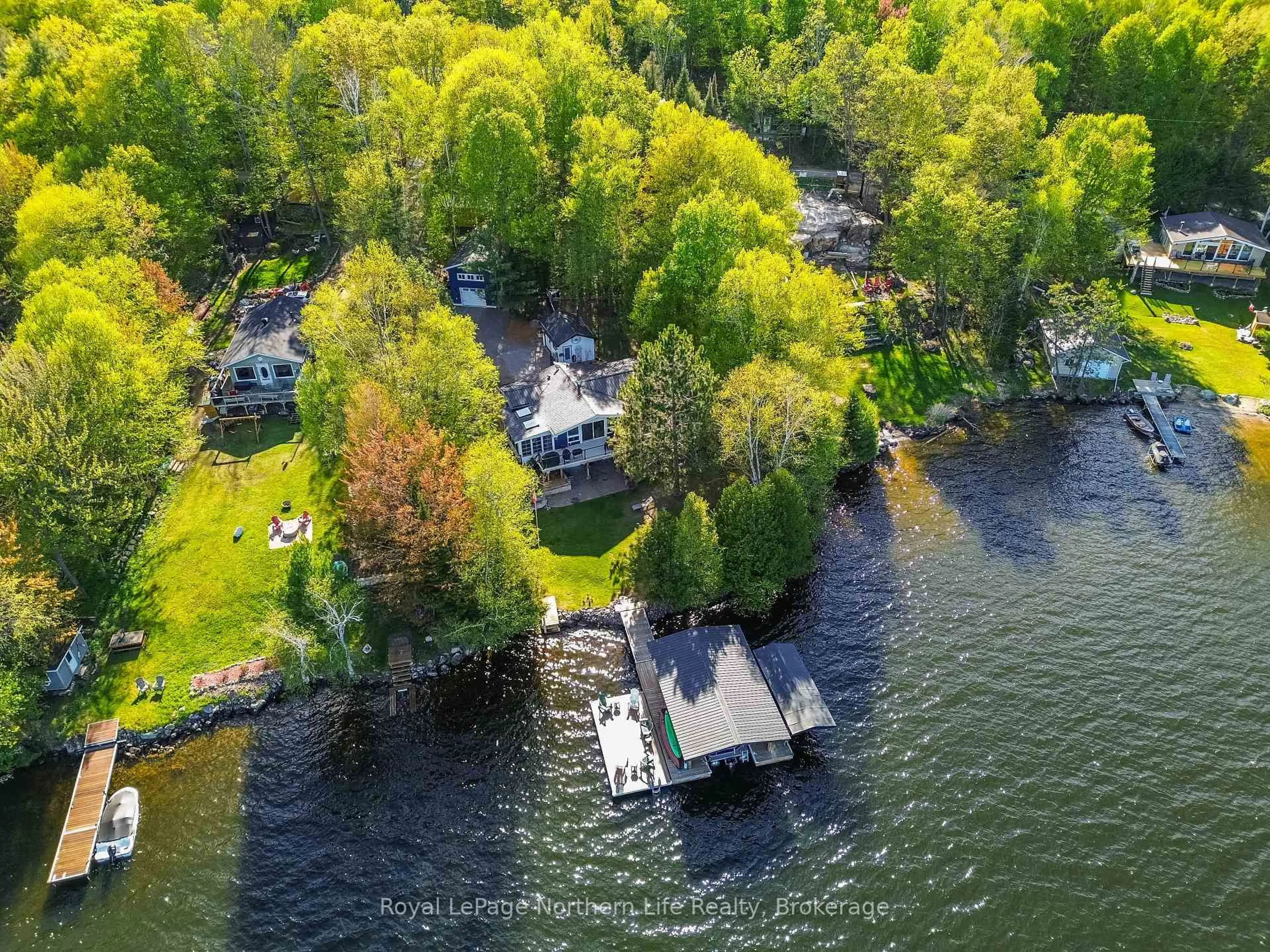 A pic from outside/outdoor area/front of a property/back of a property/a pic from drone, water/lake/river/ocean view for 84 Kyle Rd, East Ferris Ontario P0H 1K0
