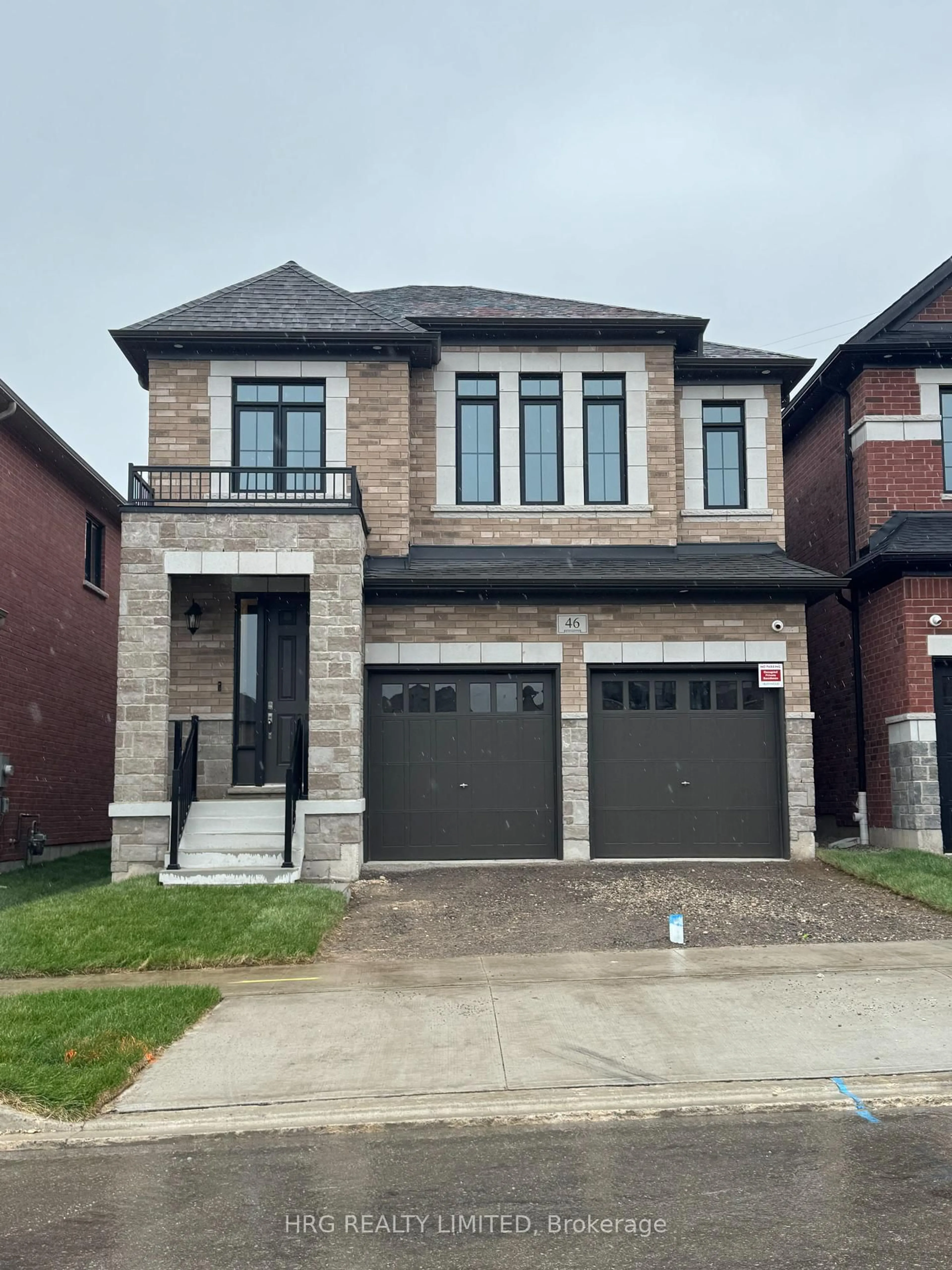 Home with brick exterior material, street for 46 Guernsey Dr, Kitchener Ontario N2R 0T7