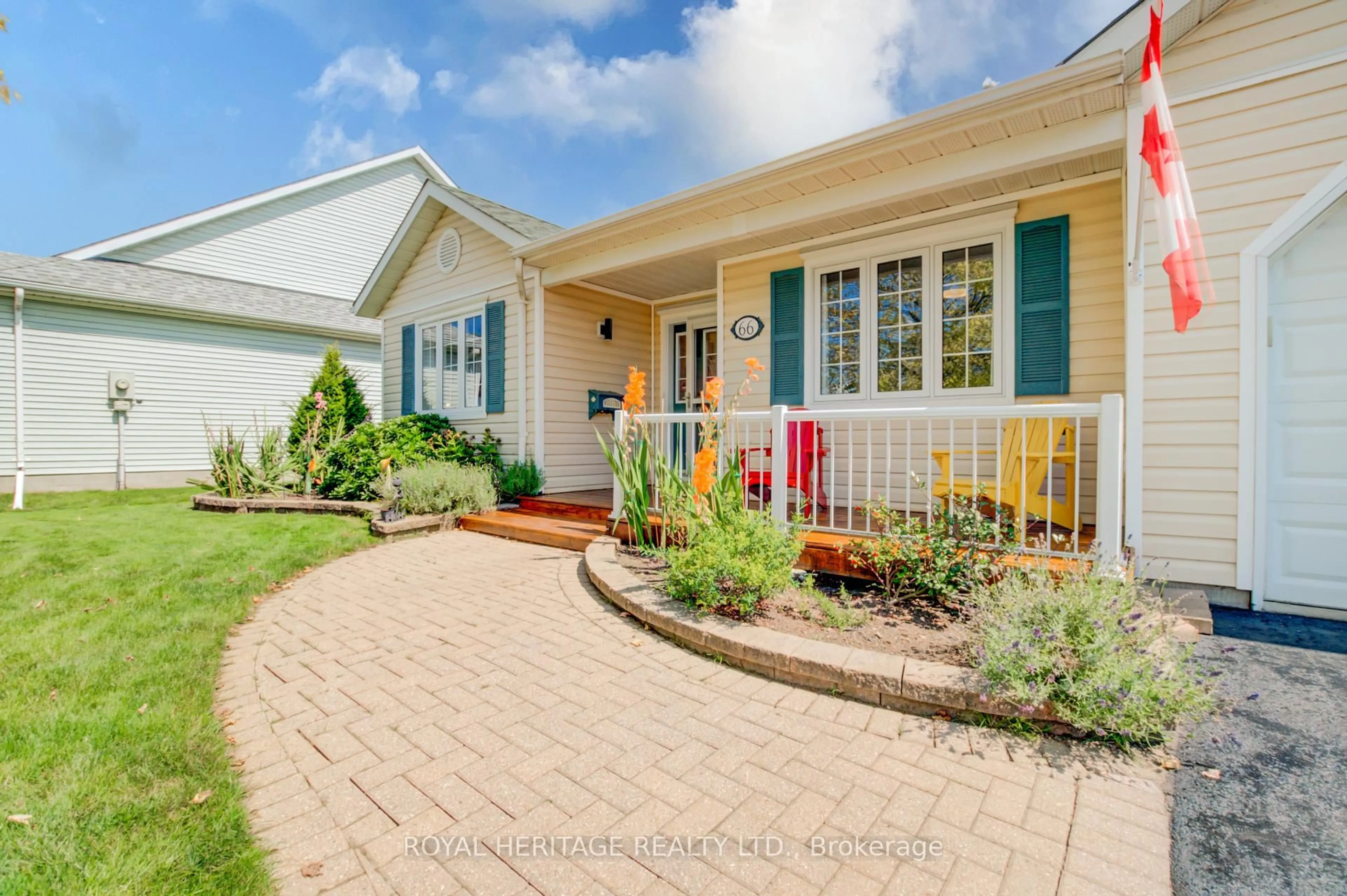 Home with vinyl exterior material, street for 66 Mills Rd, Brighton Ontario K0K 1H0