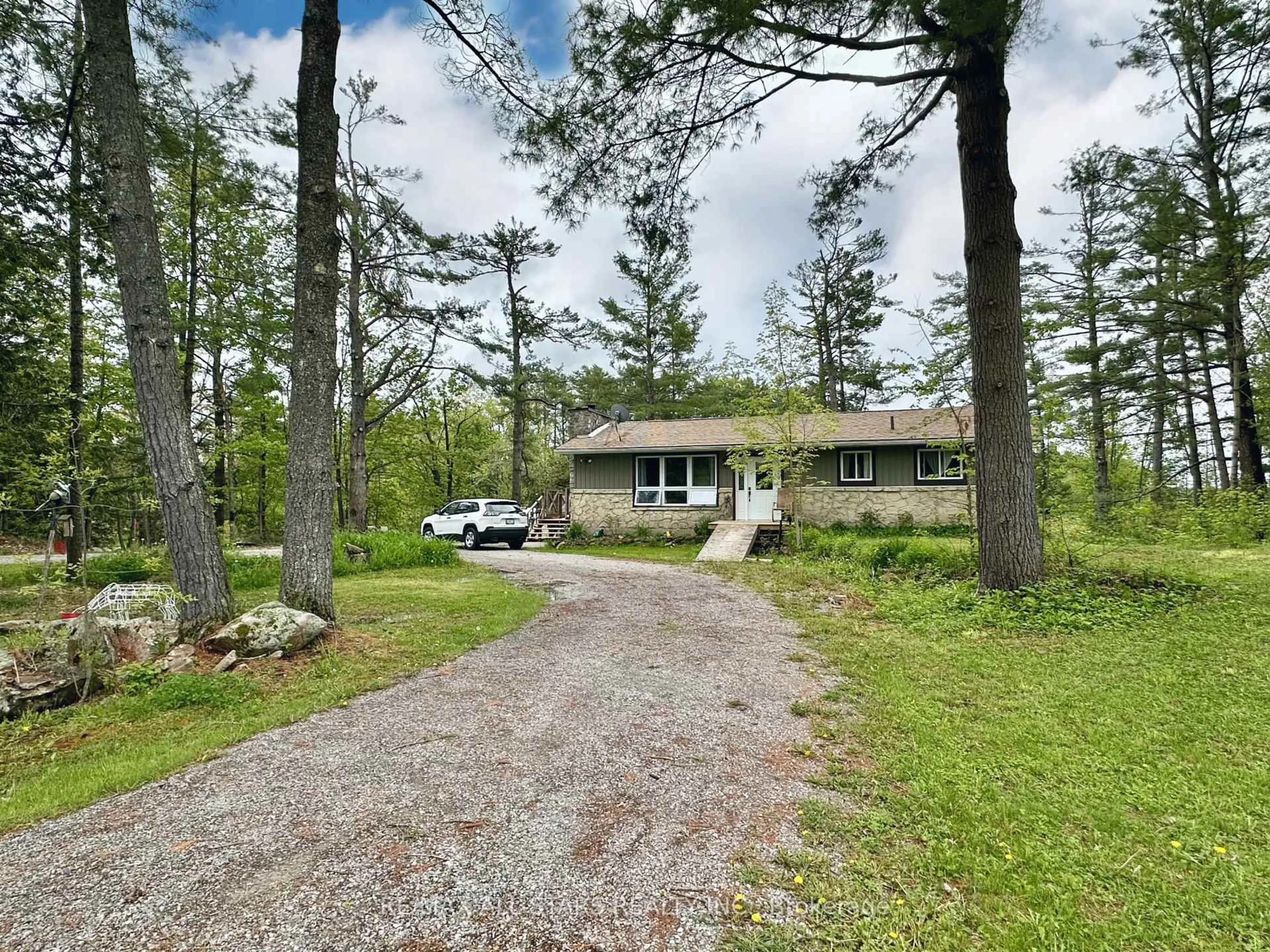 A pic from outside/outdoor area/front of a property/back of a property/a pic from drone, unknown for 71 Laxton Twp 4th Line, Kawartha Lakes Ontario K0M 2B0