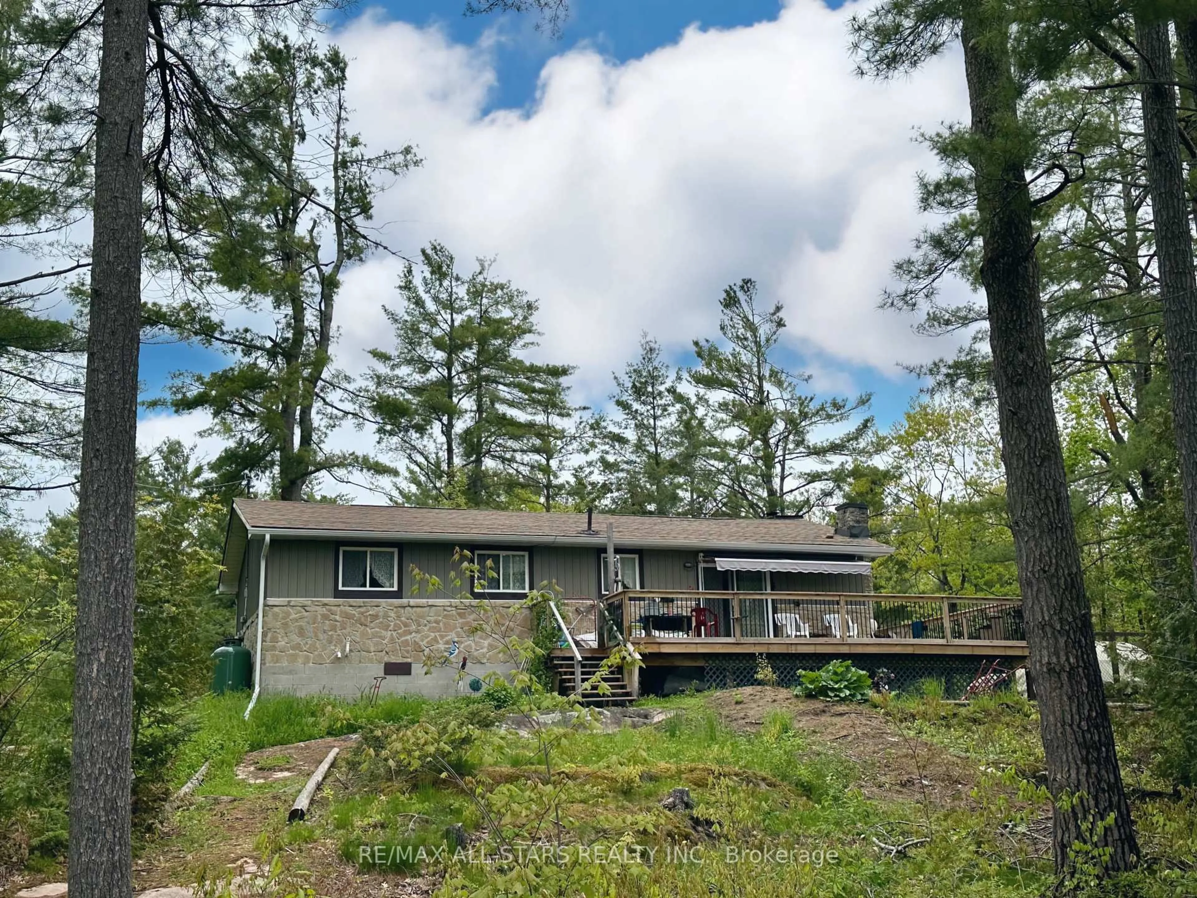 A pic from outside/outdoor area/front of a property/back of a property/a pic from drone, forest/trees view for 71 Laxton Twp 4th Line, Kawartha Lakes Ontario K0M 2B0