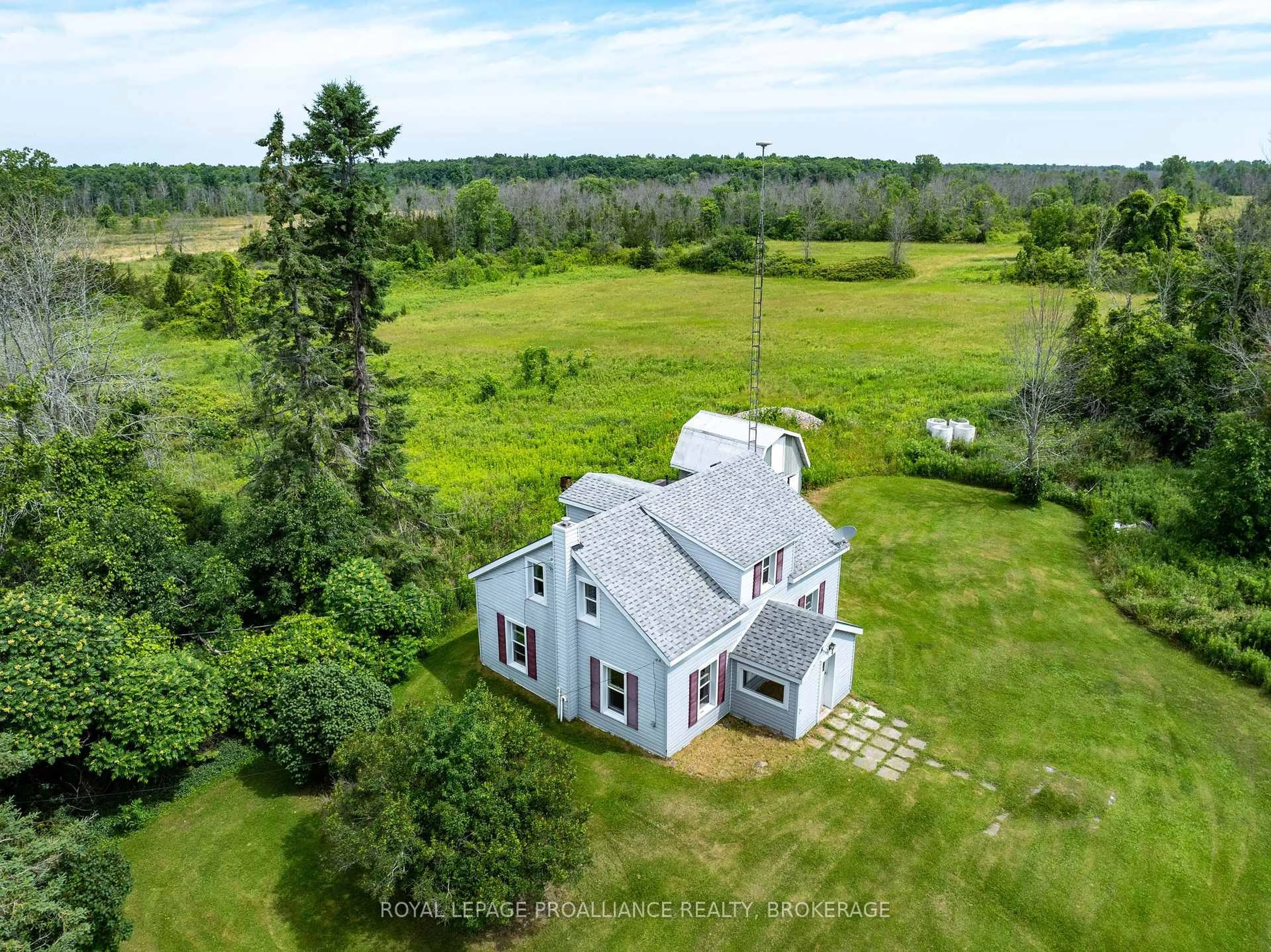 A pic from outside/outdoor area/front of a property/back of a property/a pic from drone, unknown for 661 County Rd 25, Napanee Ontario K7R 3K7