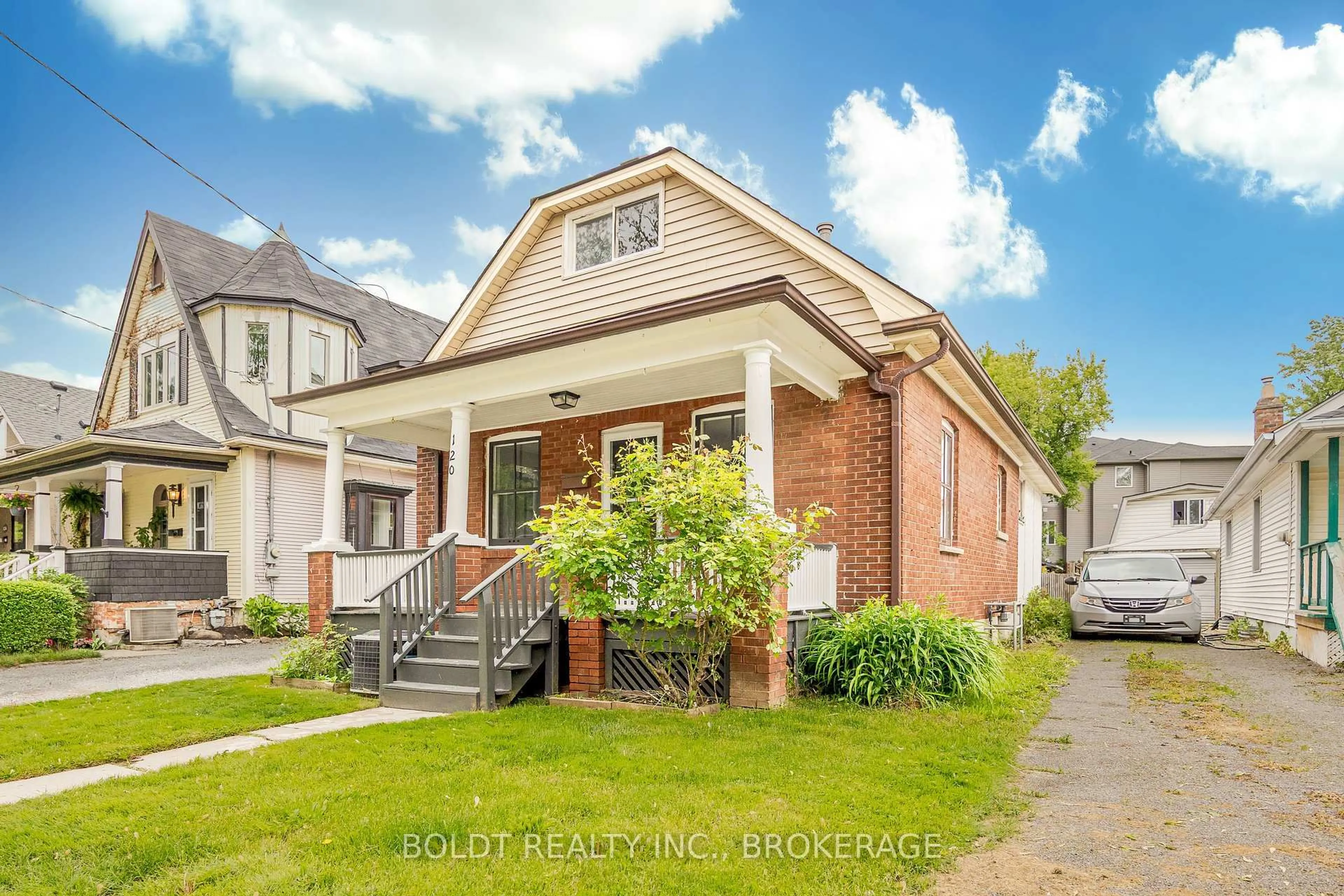 Home with brick exterior material, street for 120 Page St, St. Catharines Ontario L2R 4A9