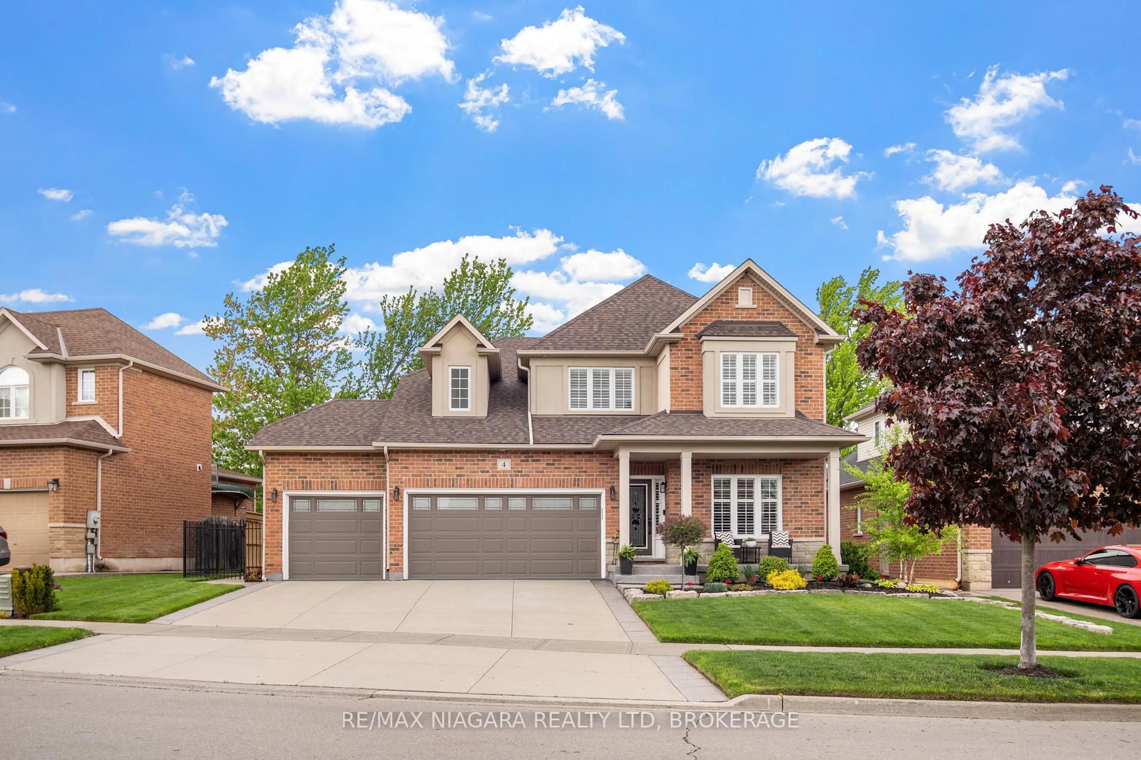 Home with brick exterior material, street for 4 Golf Woods Dr, Grimsby Ontario L3M 5P5