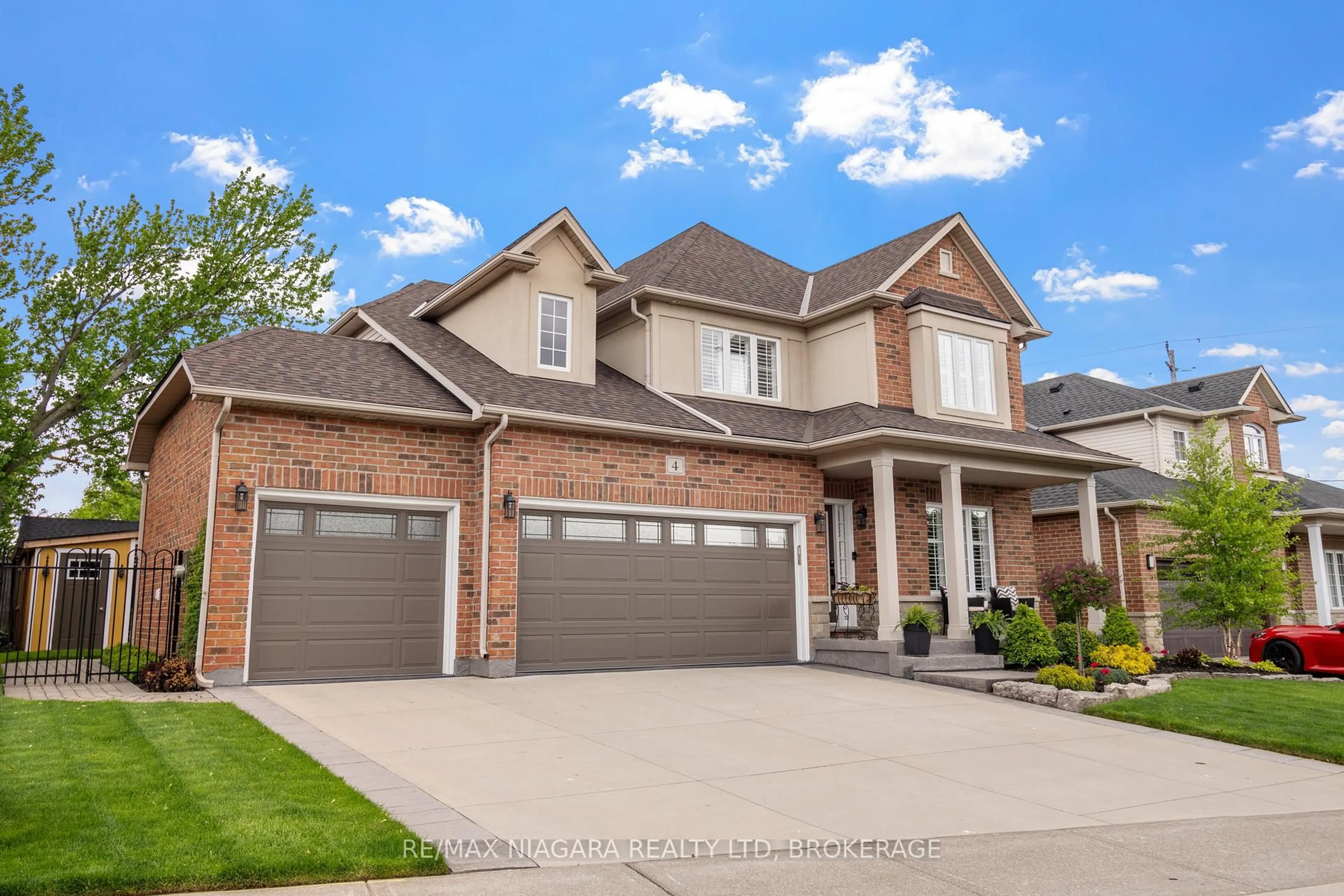 Home with brick exterior material, street for 4 Golf Woods Dr, Grimsby Ontario L3M 5P5