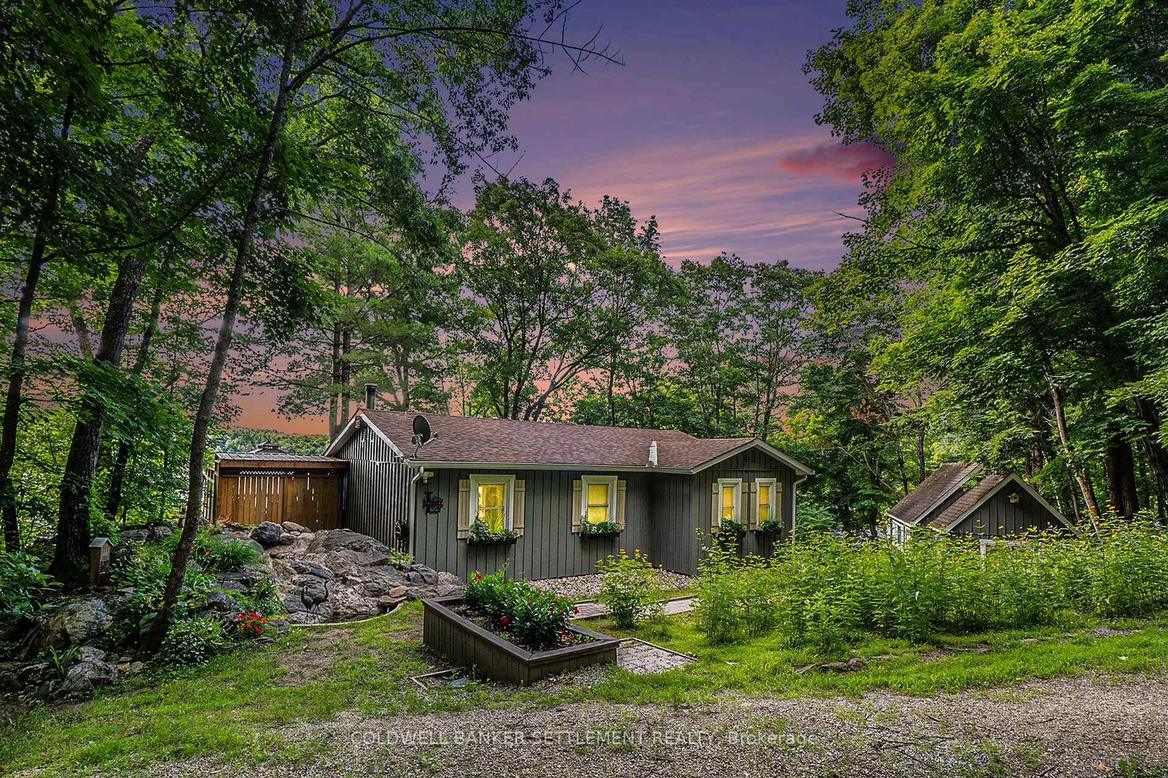 A pic from outside/outdoor area/front of a property/back of a property/a pic from drone, forest/trees view for 473 Sherbrooke Dr, Maberly Ontario K0H 2B0