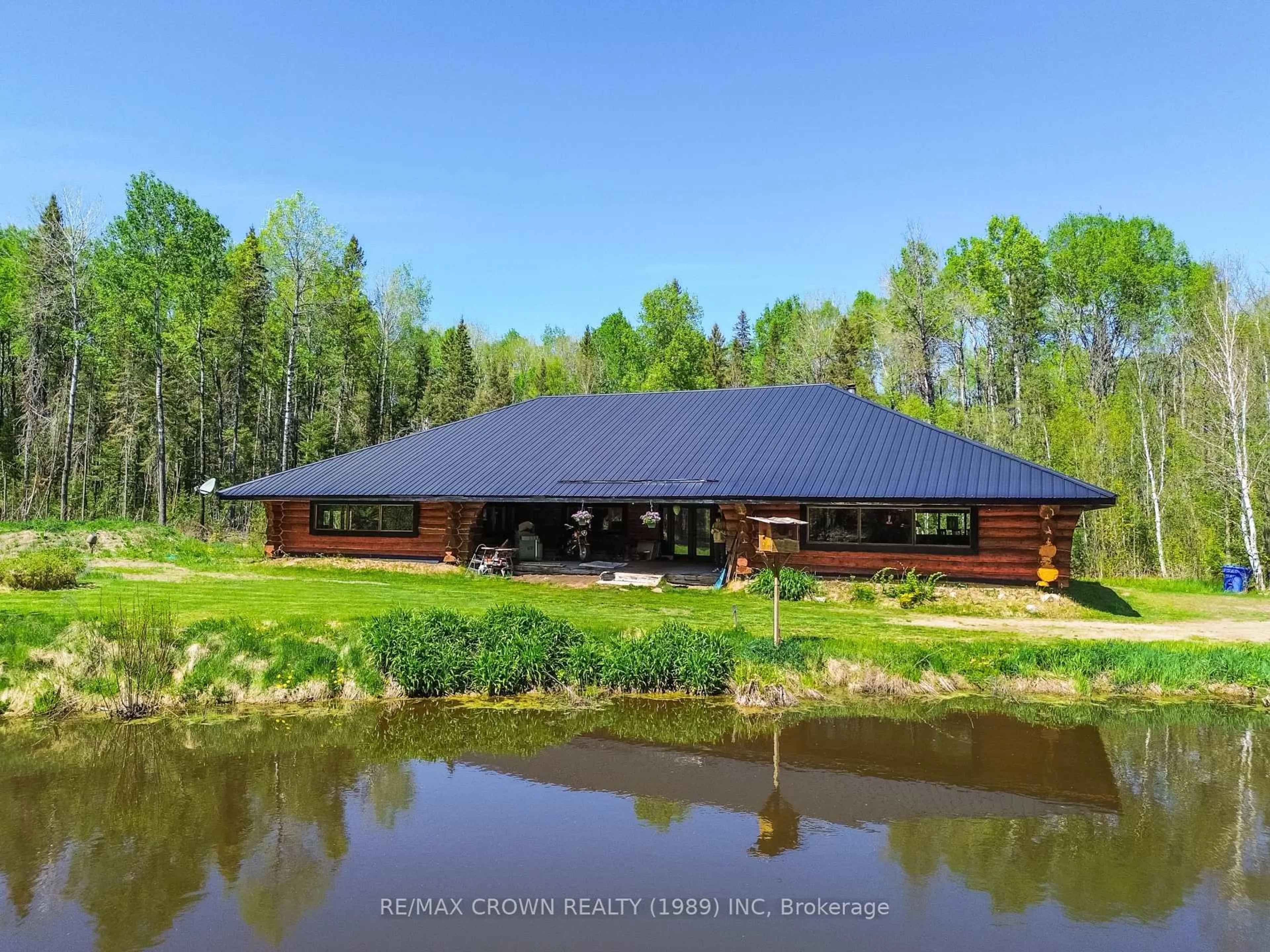 A pic from outside/outdoor area/front of a property/back of a property/a pic from drone, water/lake/river/ocean view for 398 Grahamvale Rd, East Ferris Ontario P0H 1B0
