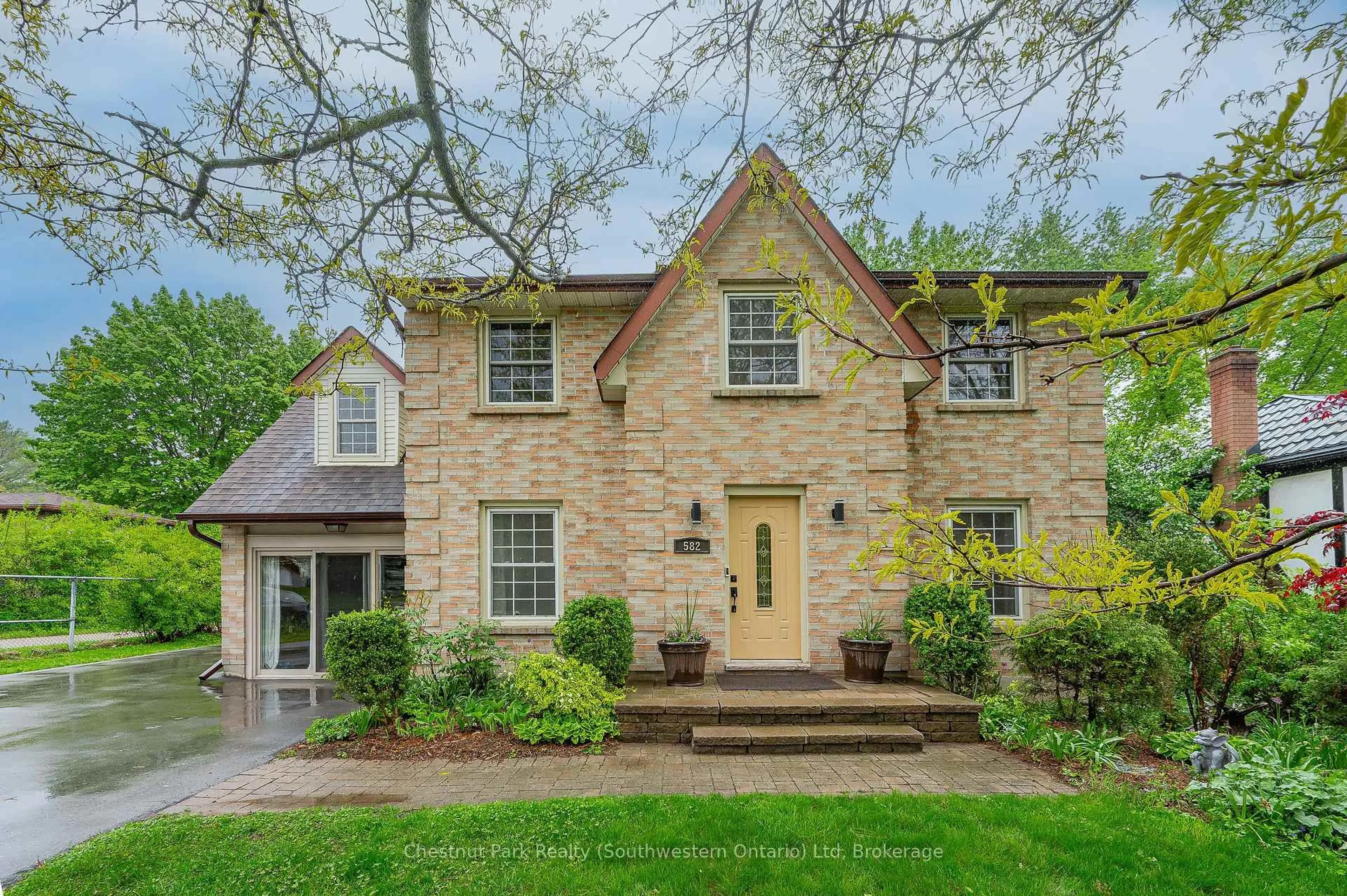Home with brick exterior material, street for 582 KORTRIGHT Rd, Guelph Ontario N1G 3H8