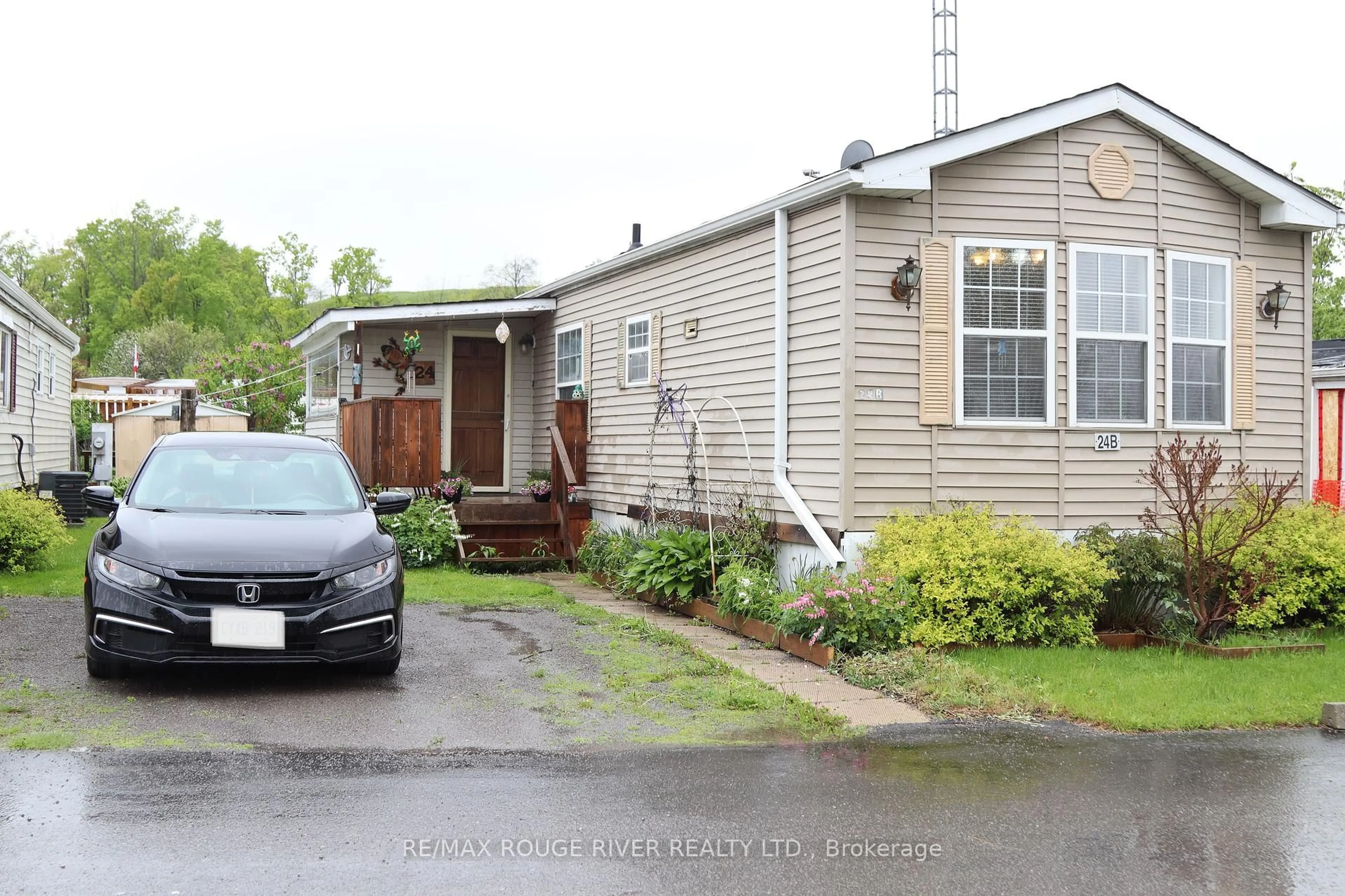 Home with vinyl exterior material, street for 2244 Heritage Line #24B, Otonabee-South Monaghan Ontario K9J 6X8