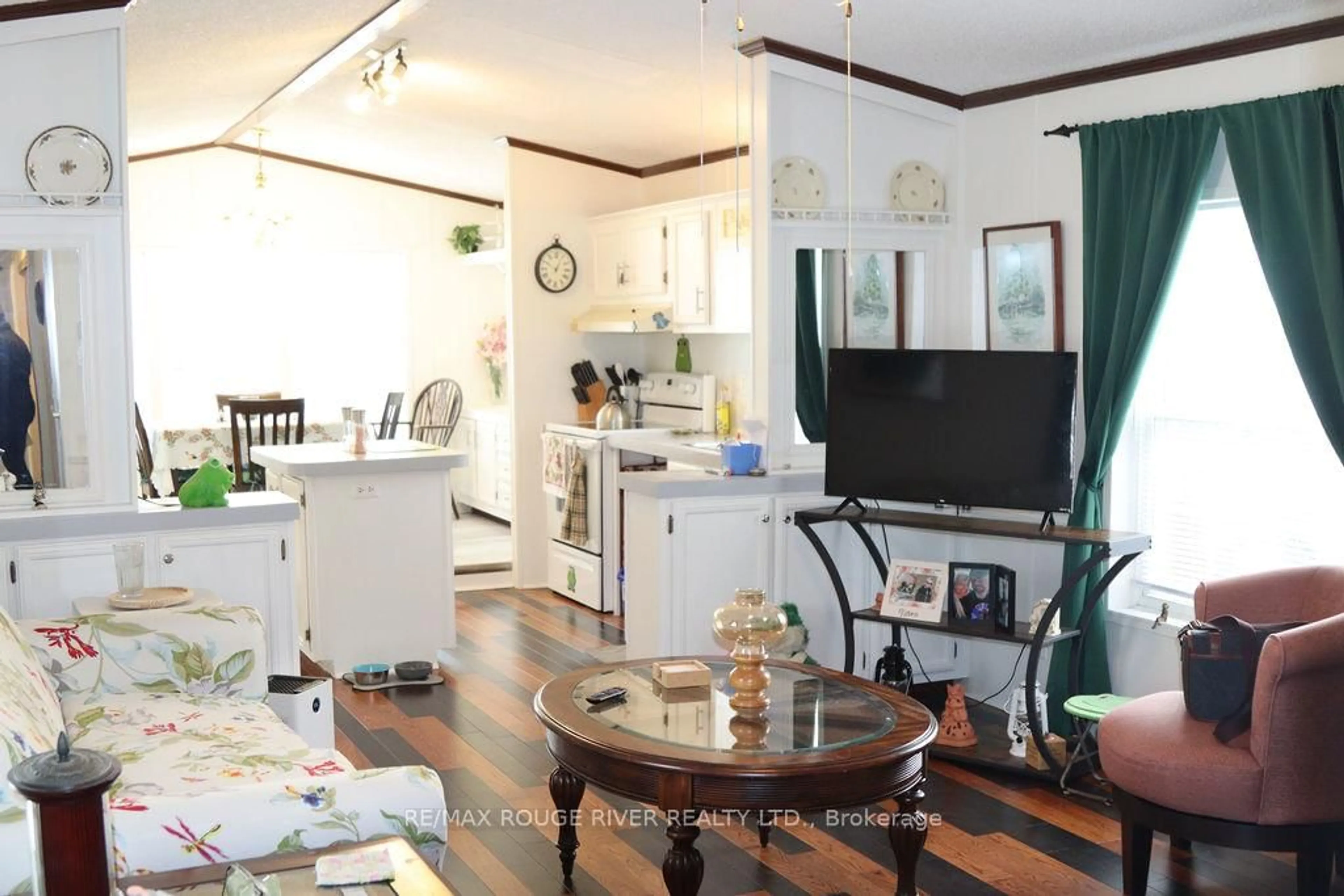 Open concept kitchen, wood/laminate floor for 2244 Heritage Line #24B, Otonabee-South Monaghan Ontario K9J 6X8