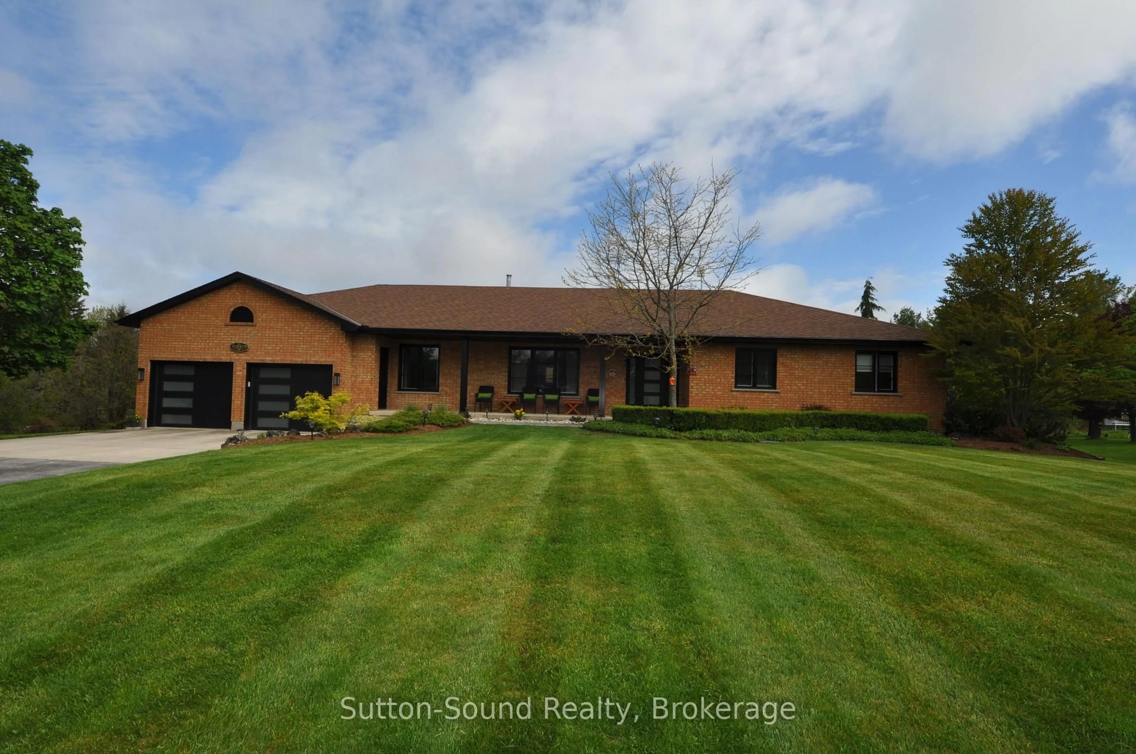 A pic from outside/outdoor area/front of a property/back of a property/a pic from drone, water/lake/river/ocean view for 243097 Side Road 21 Sdrd, Meaford Ontario N4K 5N3