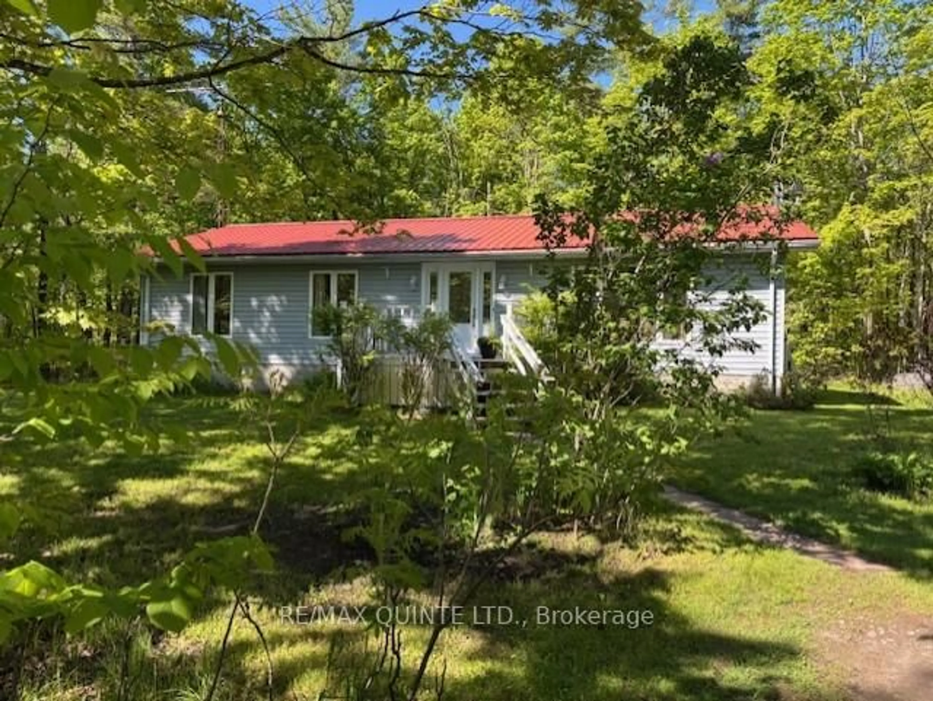 A pic from outside/outdoor area/front of a property/back of a property/a pic from drone, forest/trees view for 47 Reynolds Rd, Madoc Ontario K0K 2K0