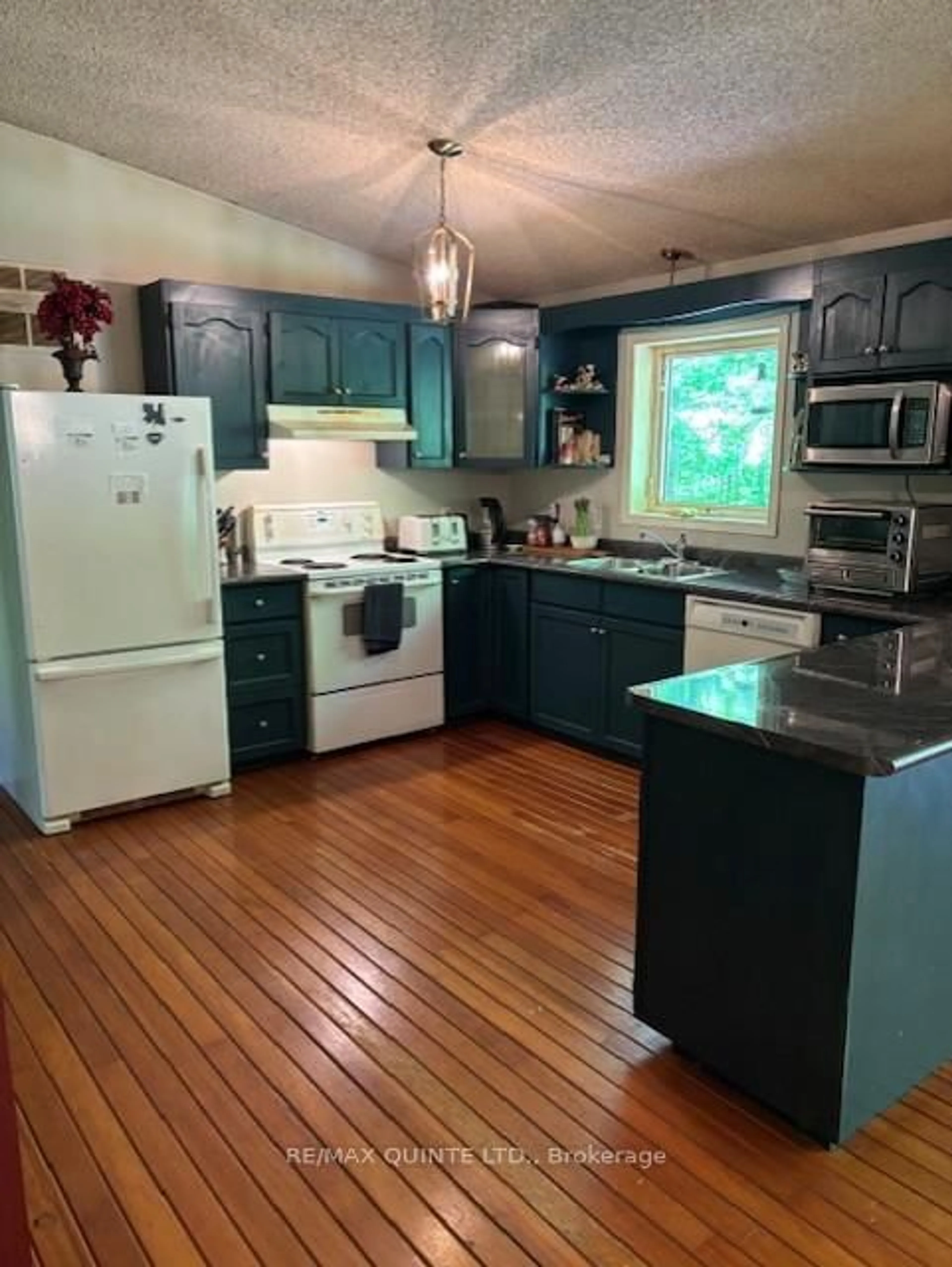 Open concept kitchen, wood/laminate floor for 47 Reynolds Rd, Madoc Ontario K0K 2K0