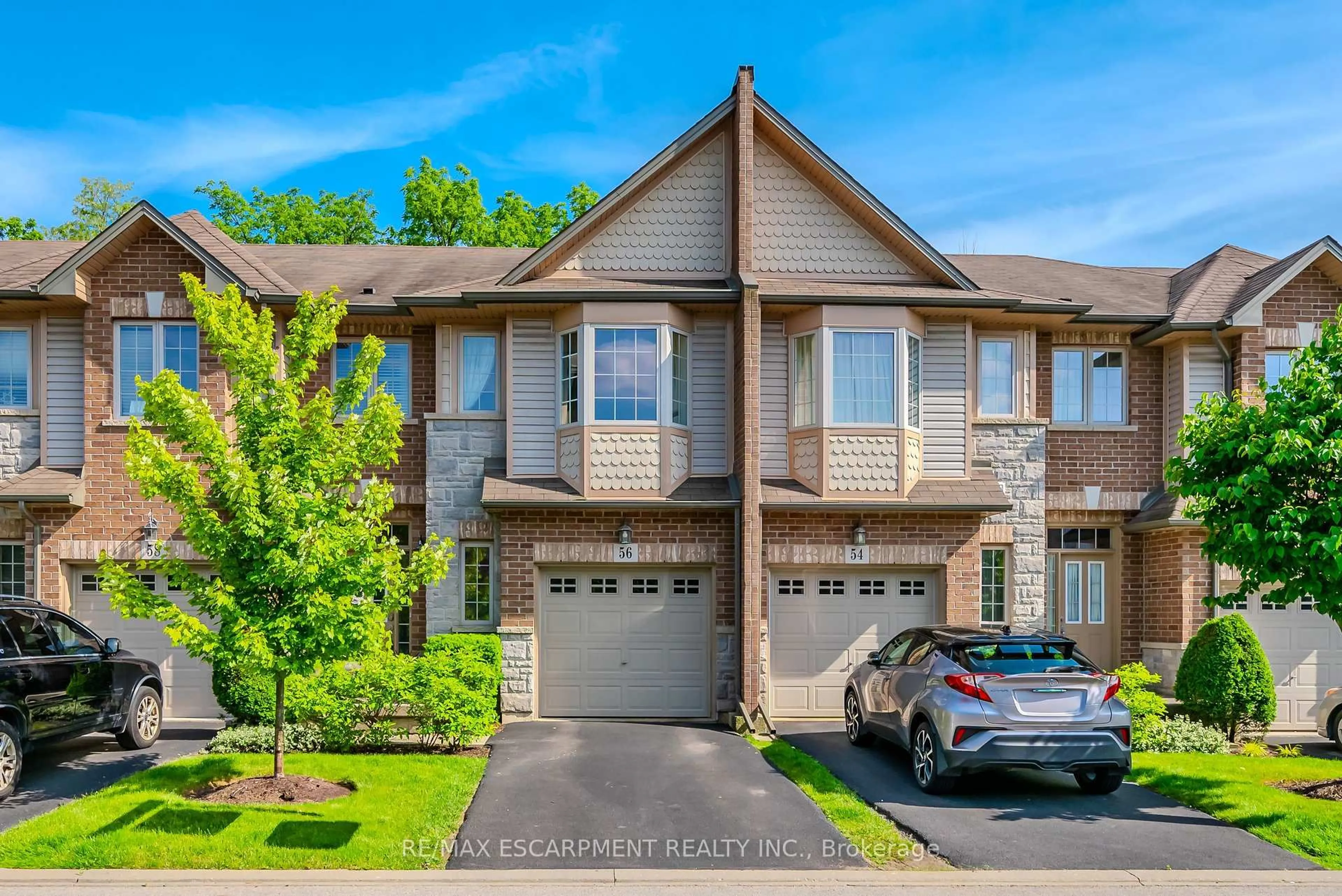 A pic from outside/outdoor area/front of a property/back of a property/a pic from drone, street for 56 Liddycoat Lane, Hamilton Ontario L9G 0A7