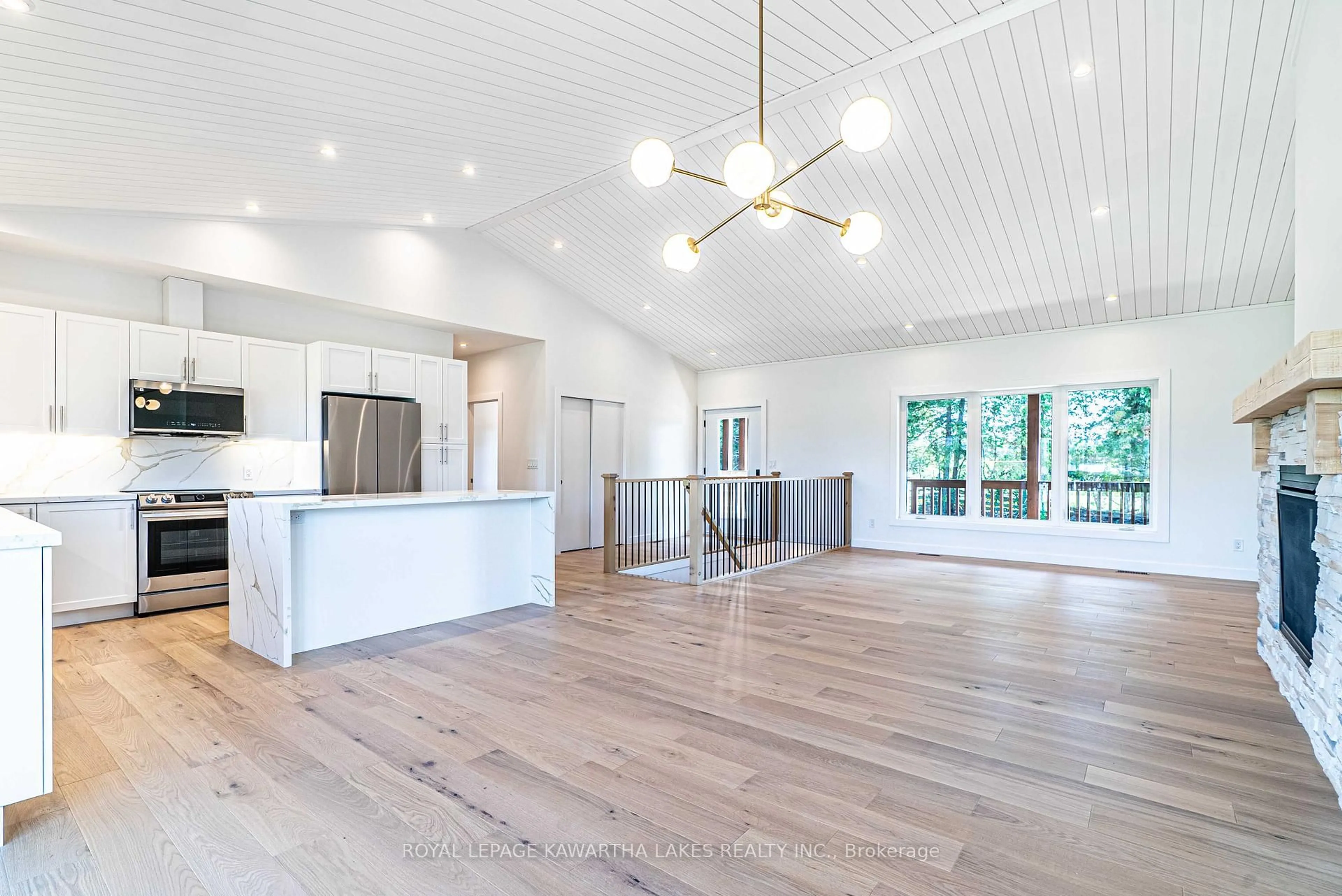 Open concept kitchen, wood/laminate floor for 33 Coshs Rd, Kawartha Lakes Ontario K0M 1A0