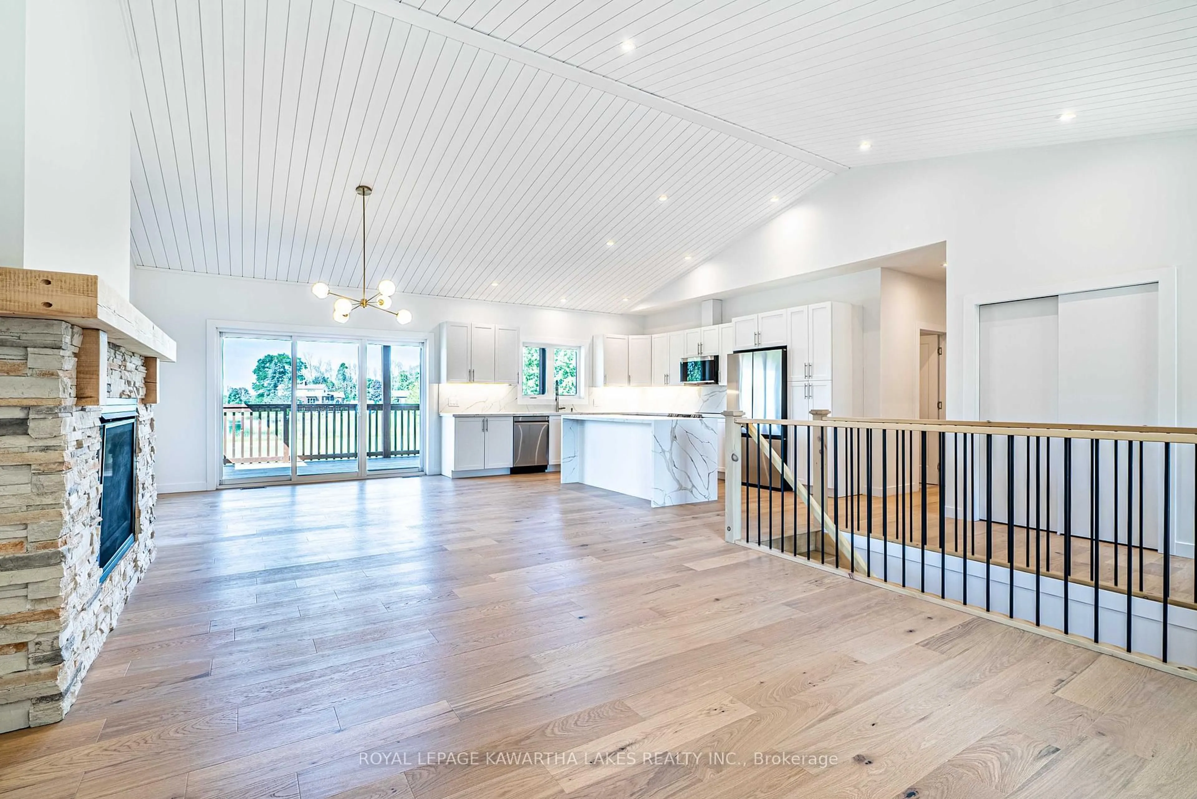 Open concept kitchen, wood/laminate floor for 33 Coshs Rd, Kawartha Lakes Ontario K0M 1A0