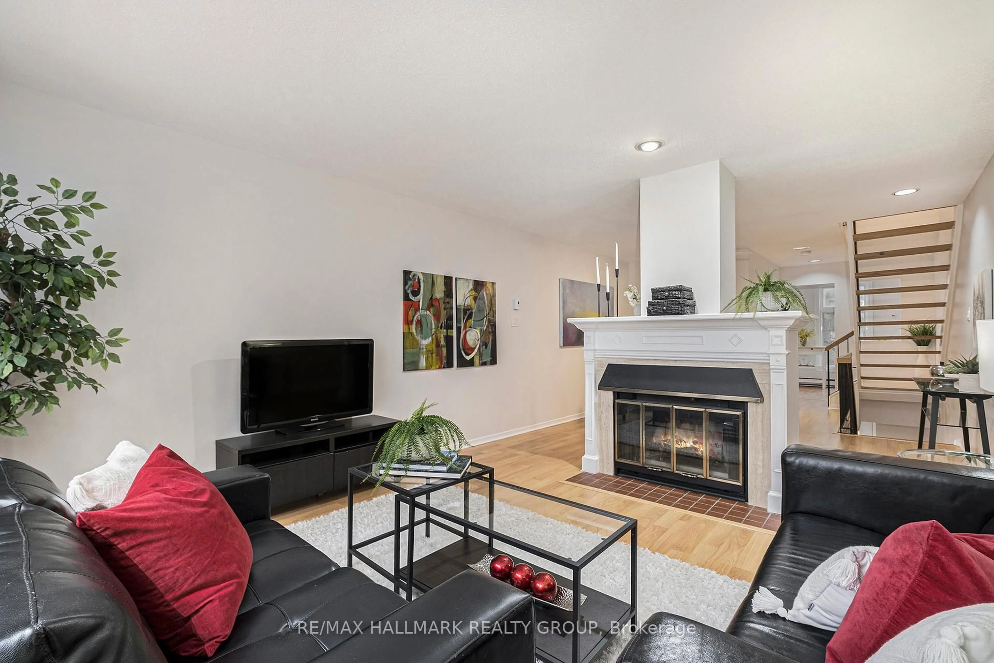 Living room with furniture, wood/laminate floor for 20 Charlevoix St #15, Ottawa Ontario K1L 8K5