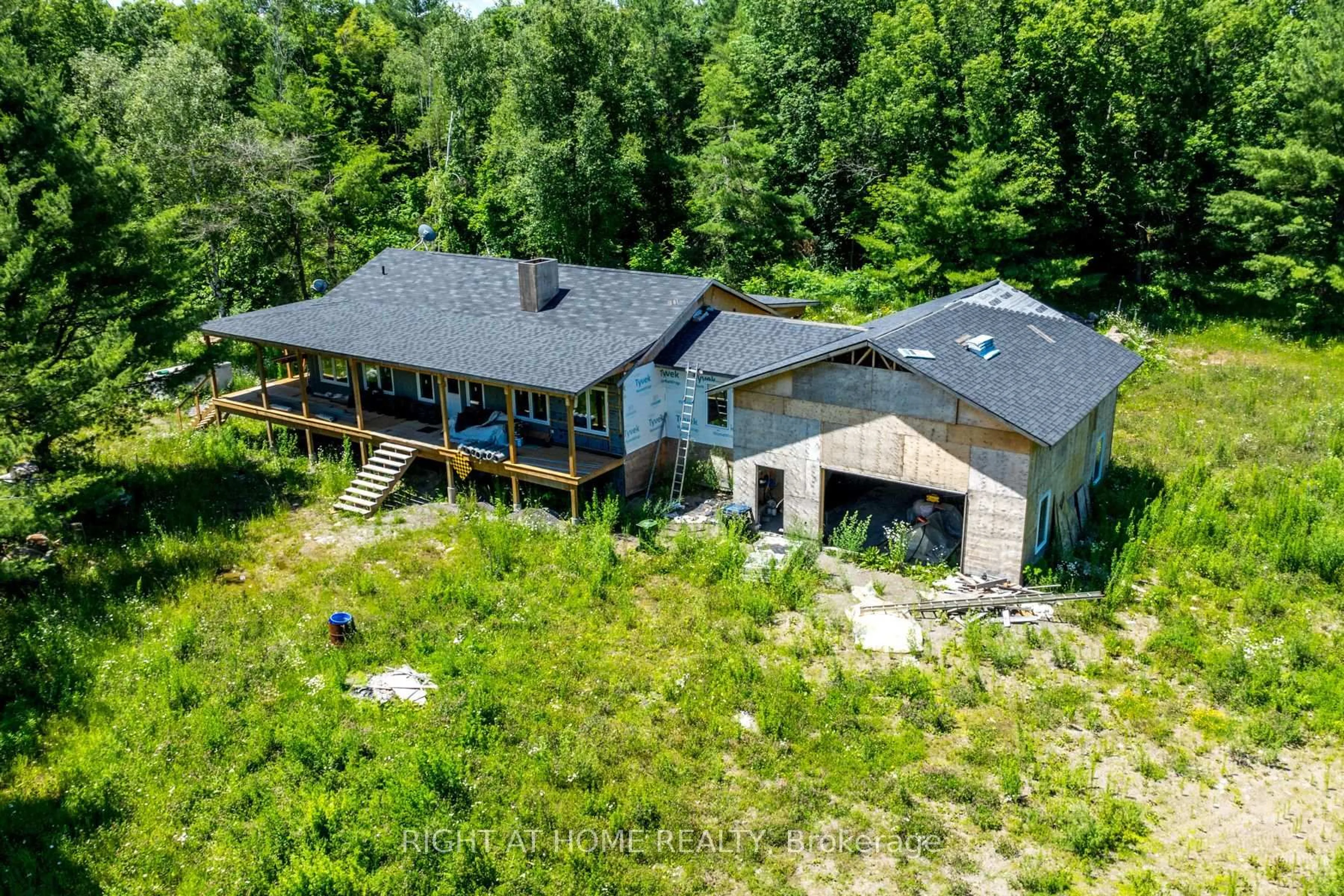 A pic from outside/outdoor area/front of a property/back of a property/a pic from drone, unknown for 1662 COUNTY ROAD 40 Rd, Douro-Dummer Ontario K0L 2V0