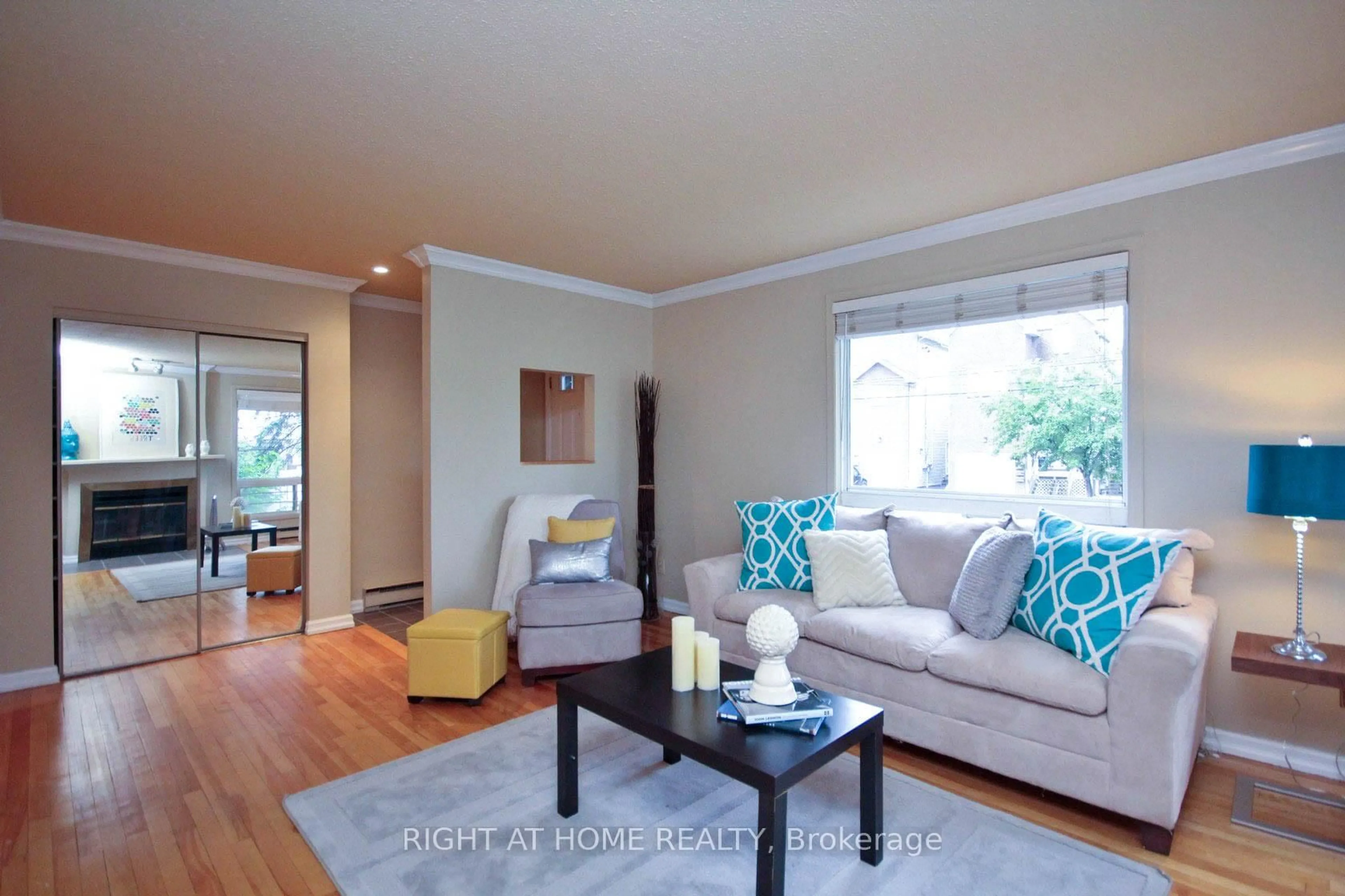 Living room with furniture, wood/laminate floor for 311 Presland Rd #A, Ottawa Ontario K1K 2B6
