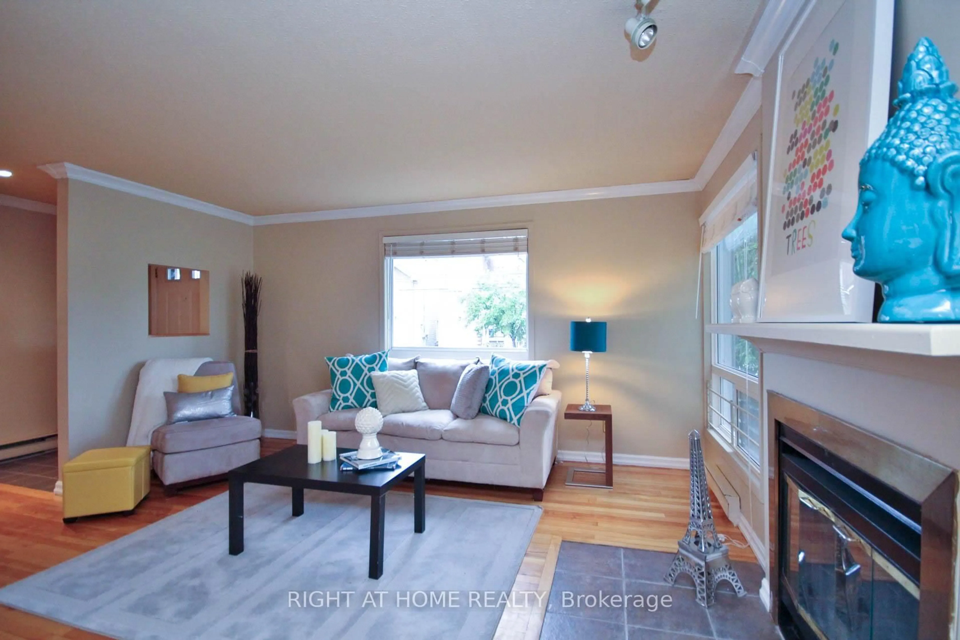 Living room with furniture, wood/laminate floor for 311 Presland Rd #A, Ottawa Ontario K1K 2B6