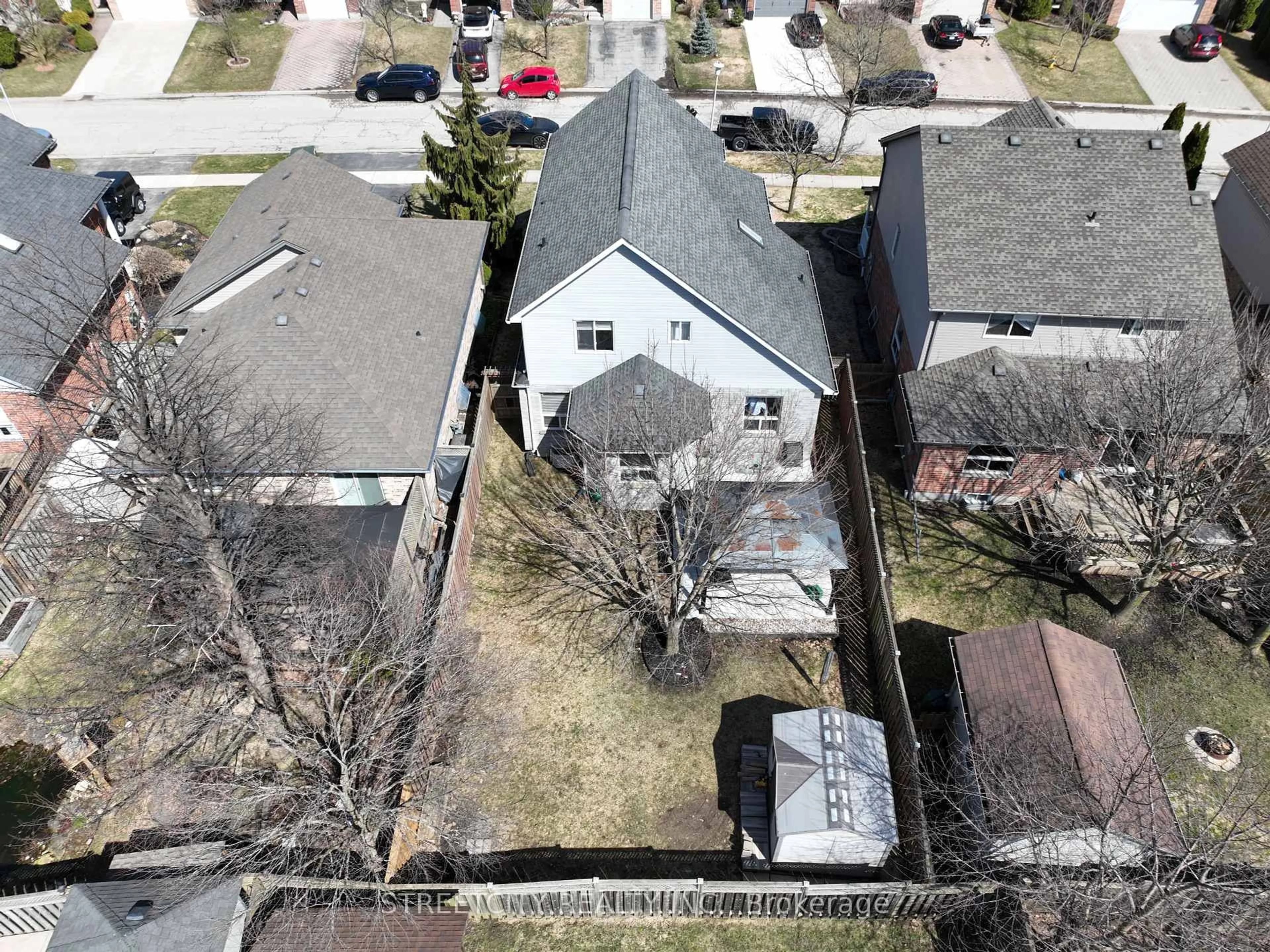 A pic from outside/outdoor area/front of a property/back of a property/a pic from drone, street for 304 White Sands Dr, London South Ontario N6M 1J2