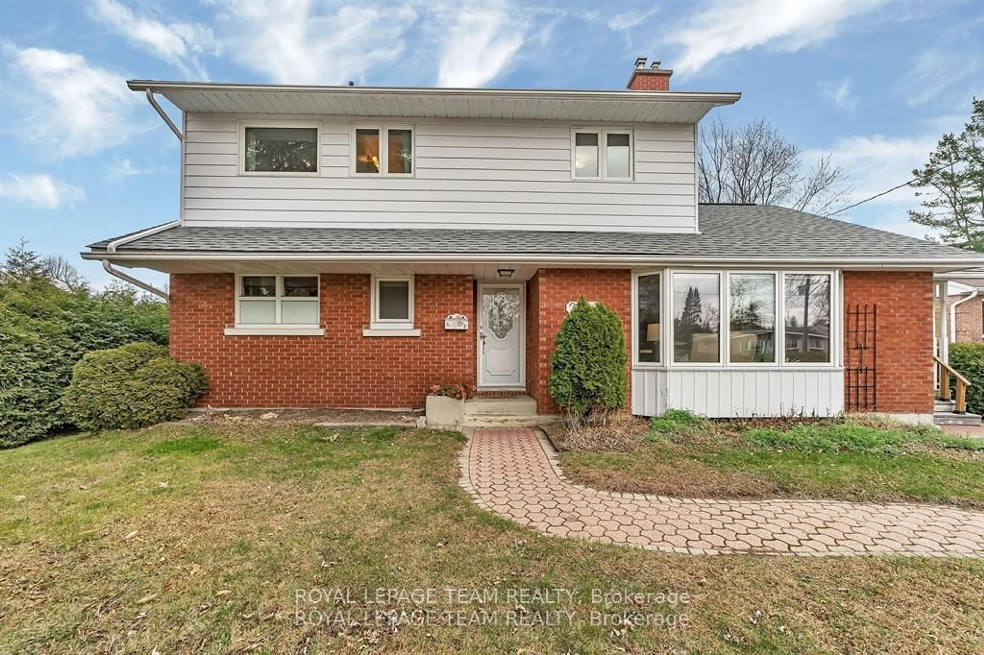 Home with brick exterior material, street for 2099 Balharrie Ave, Ottawa Ontario K1G 1G4
