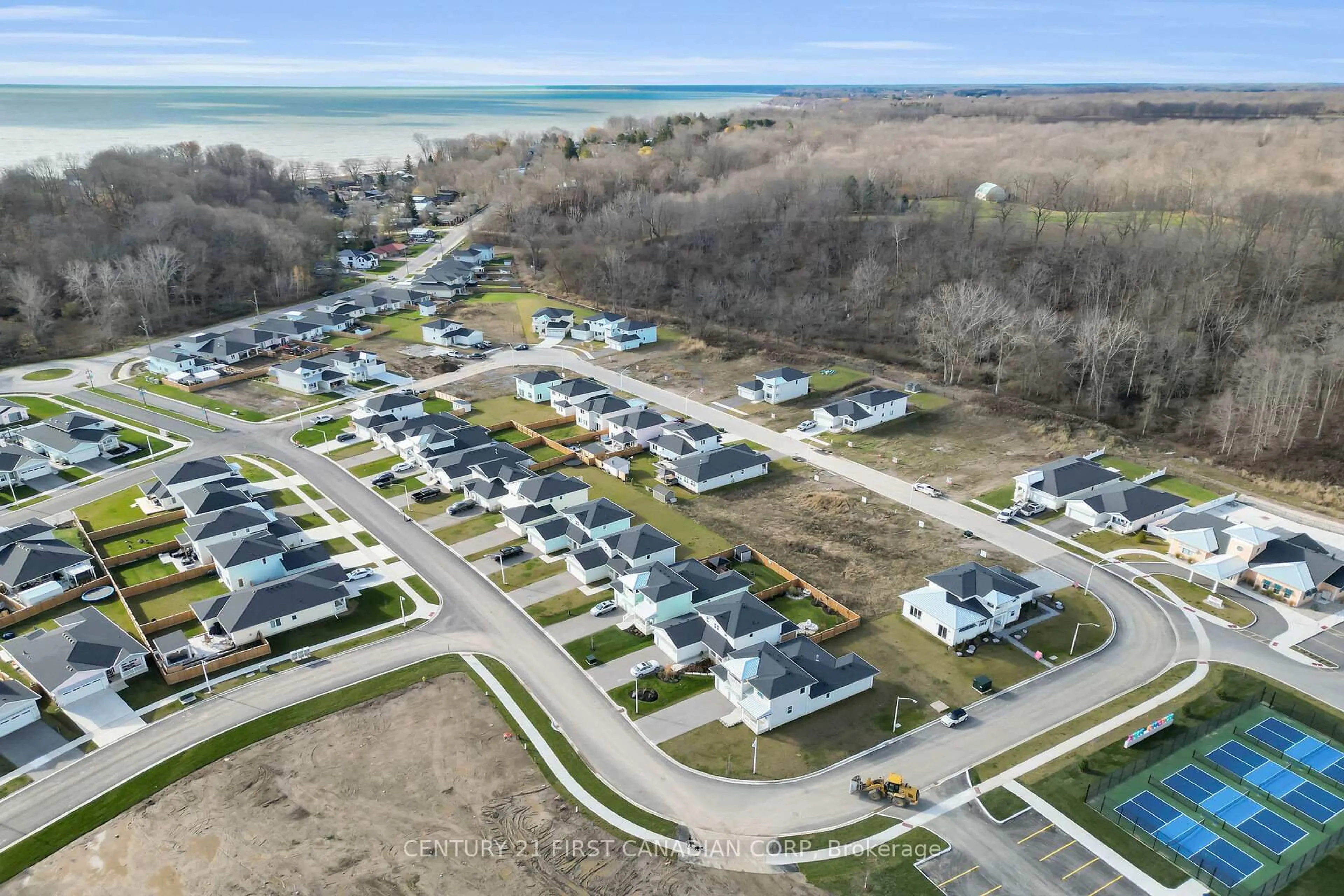 A pic from outside/outdoor area/front of a property/back of a property/a pic from drone, street for 403 Breakwater Blvd, Central Elgin Ontario N5L 0B5