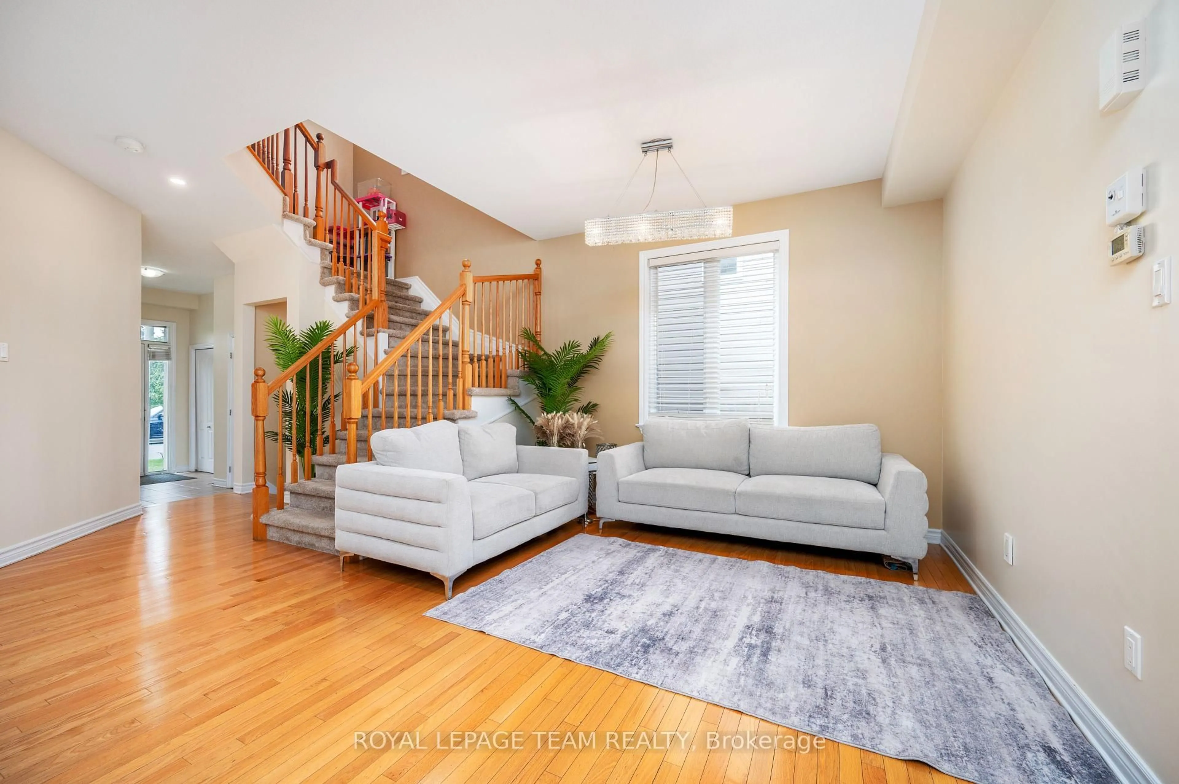 Living room with furniture, unknown for 357 Widgeon Way, Ottawa Ontario K1T 0G1