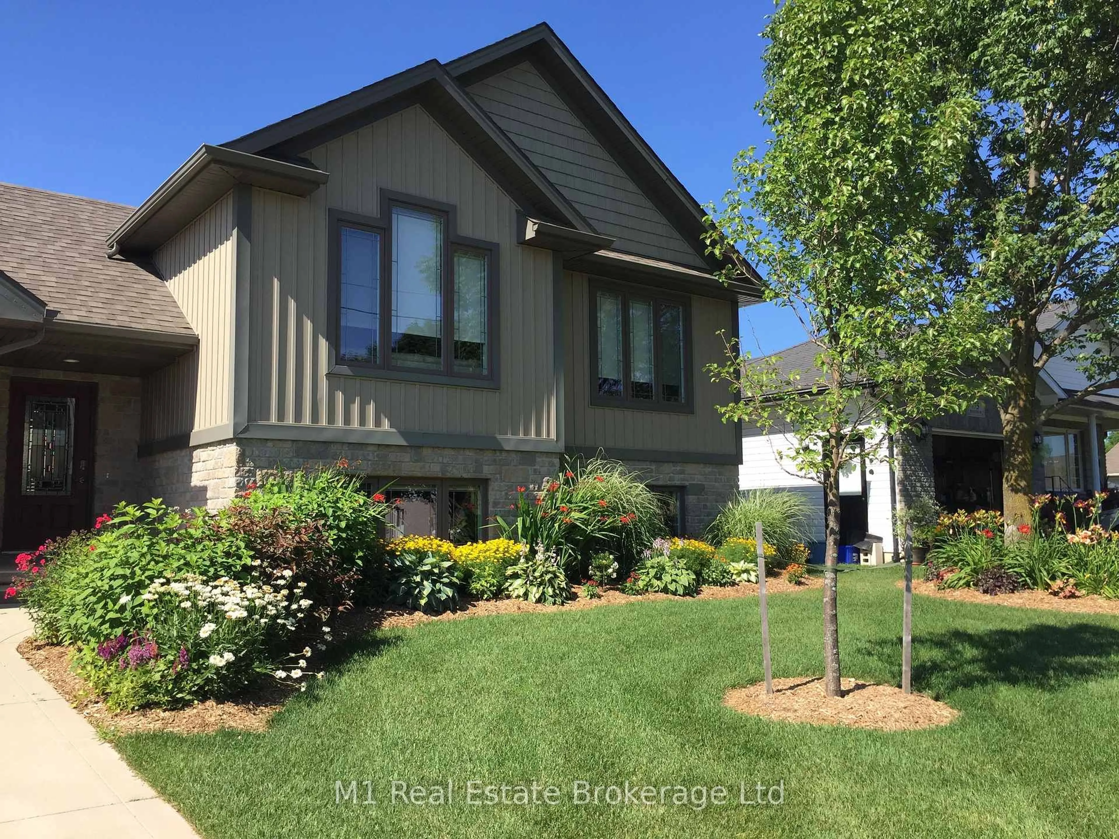 Home with vinyl exterior material, street for 781 Princess St, Wellington North Ontario N0G 2L3