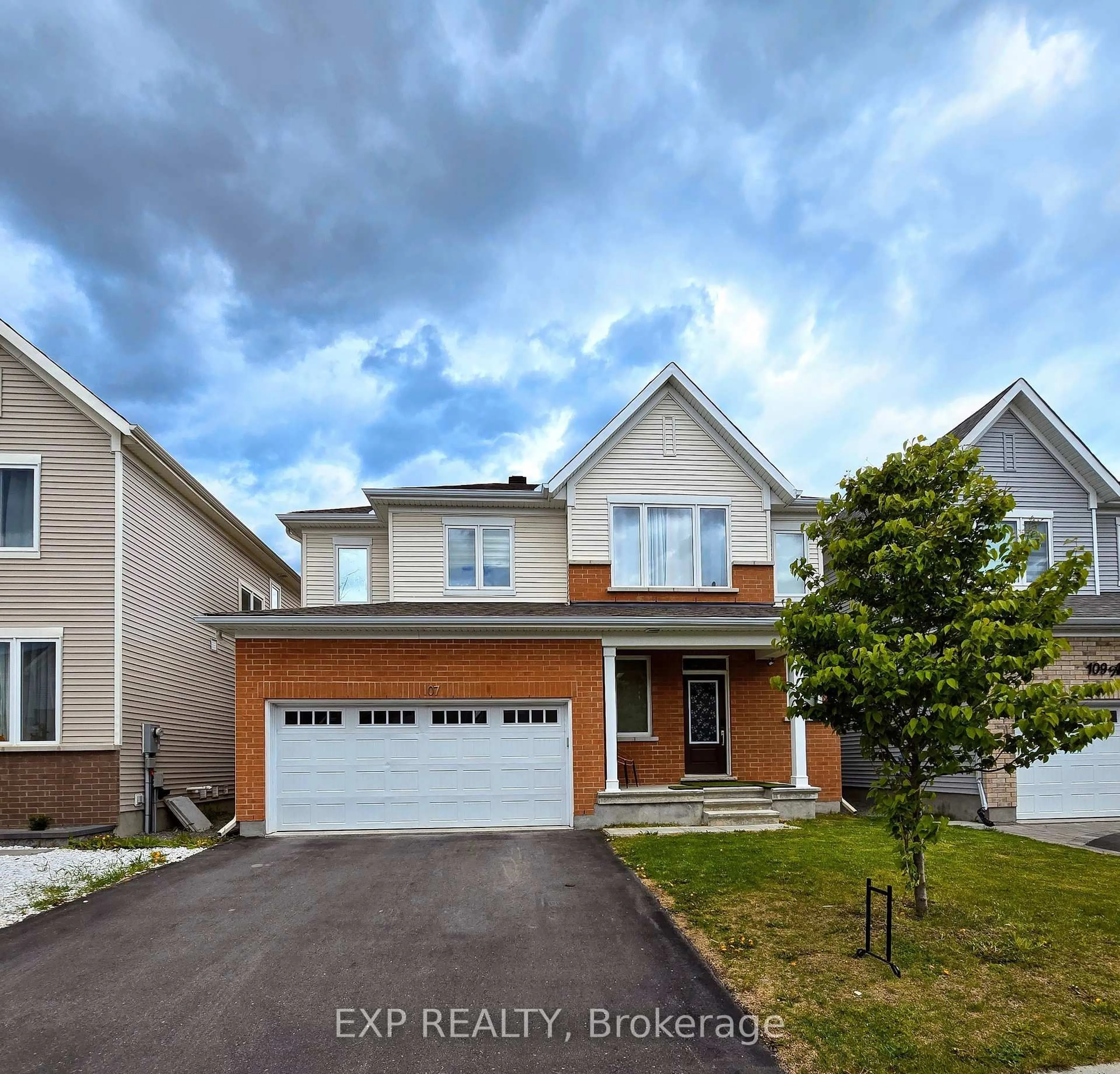 Home with vinyl exterior material, street for 107 Aubrais Cres, Ottawa Ontario K1W 0M9
