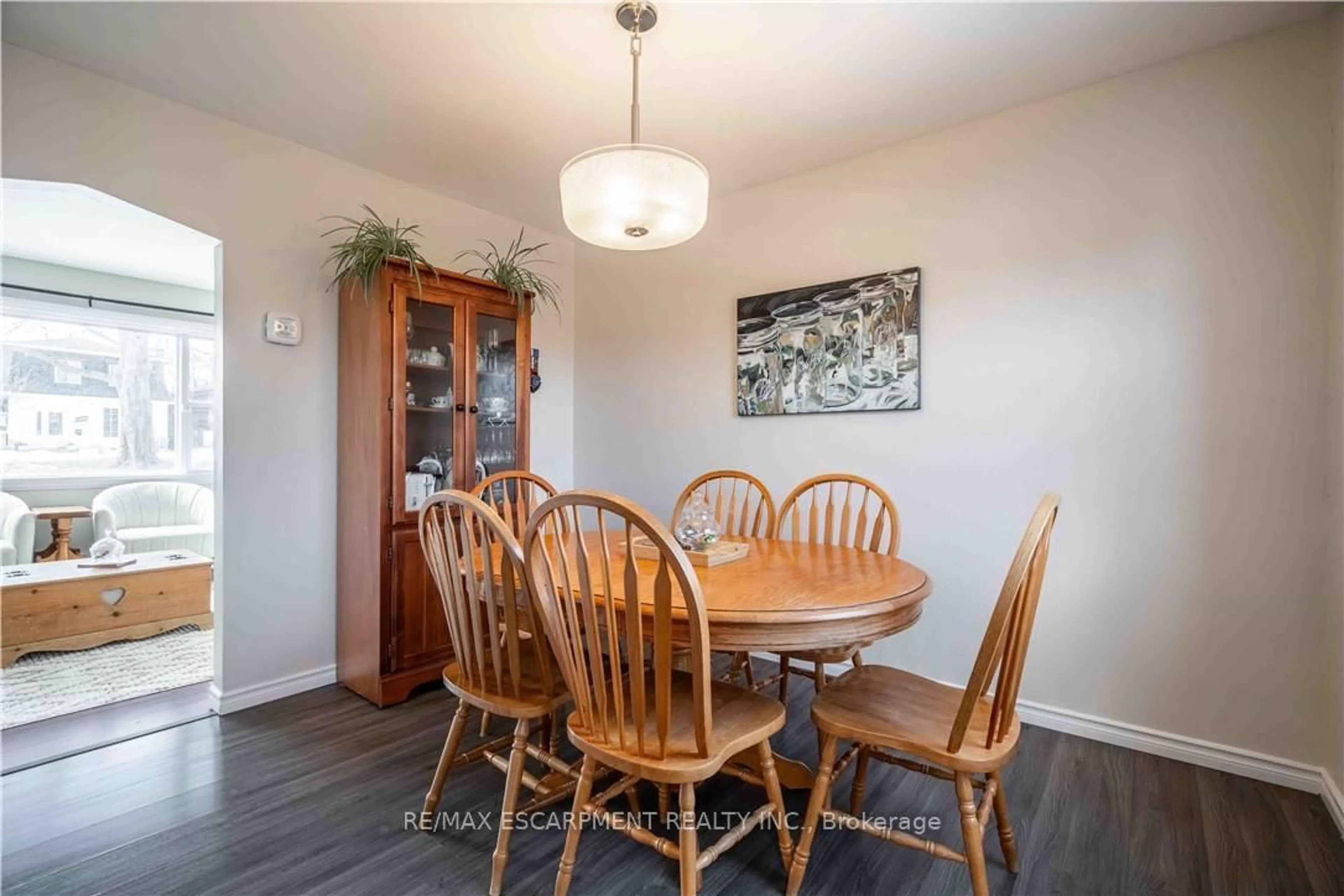 Dining room, wood/laminate floor for 2279 King St, Hamilton Ontario L8K 1X5