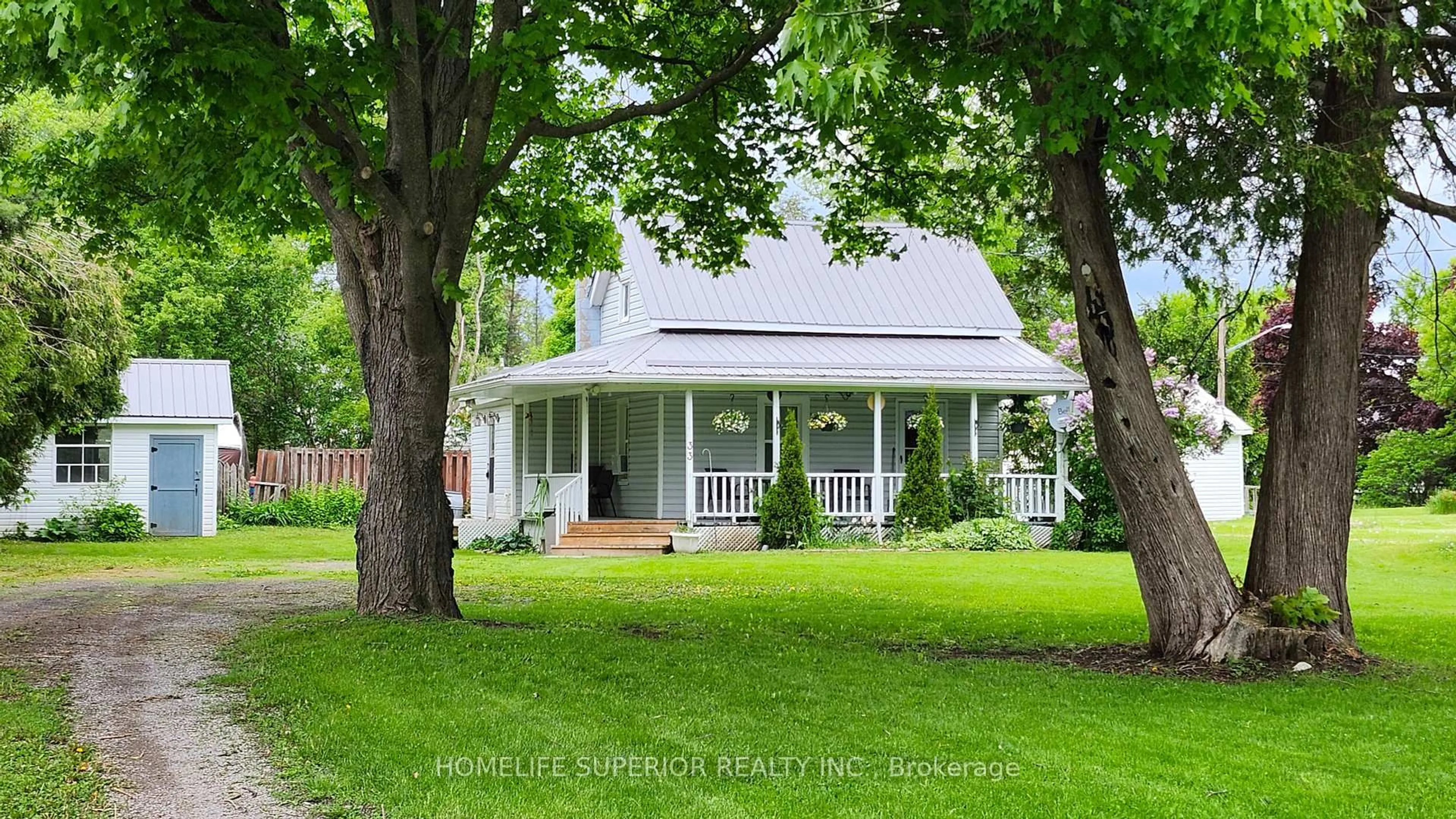 Home with vinyl exterior material, street for 33 Madoc St, Limoges Ontario K0K 2M0