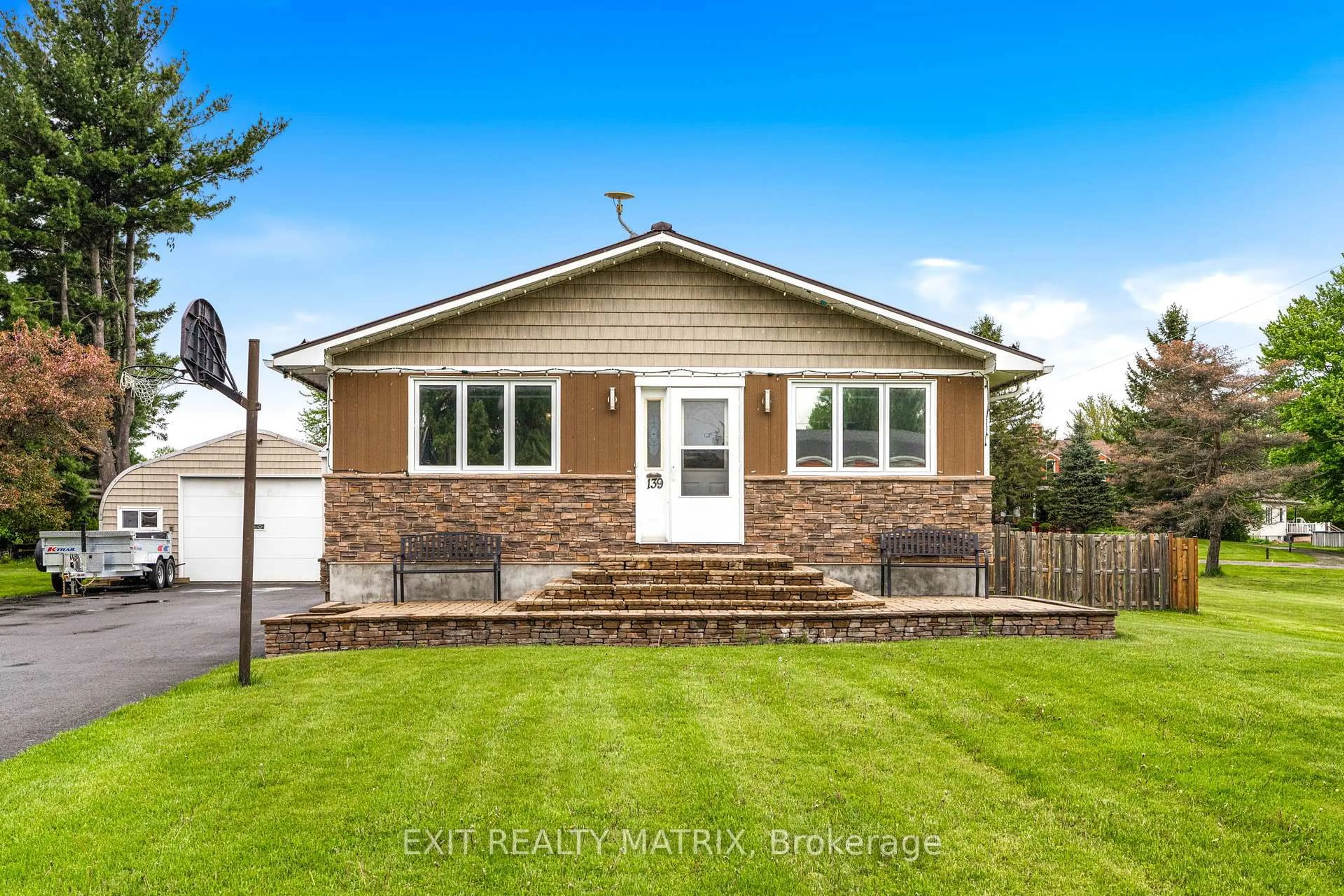 Home with vinyl exterior material, street for 139 Ottawa St, The Nation Ontario K0A 2M0