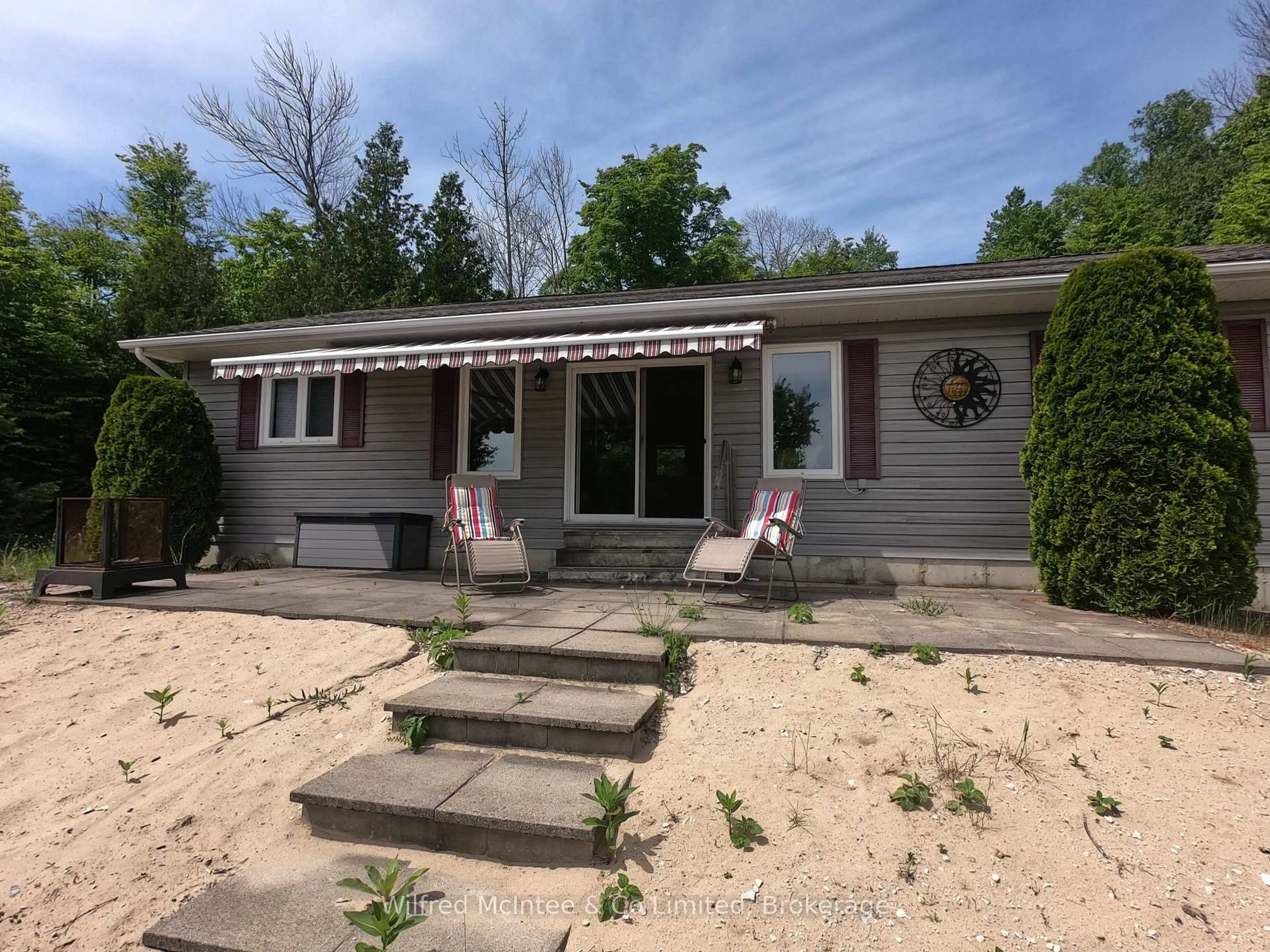 Home with vinyl exterior material, street for 35 Bryant St, South Bruce Peninsula Ontario N0H 2T0