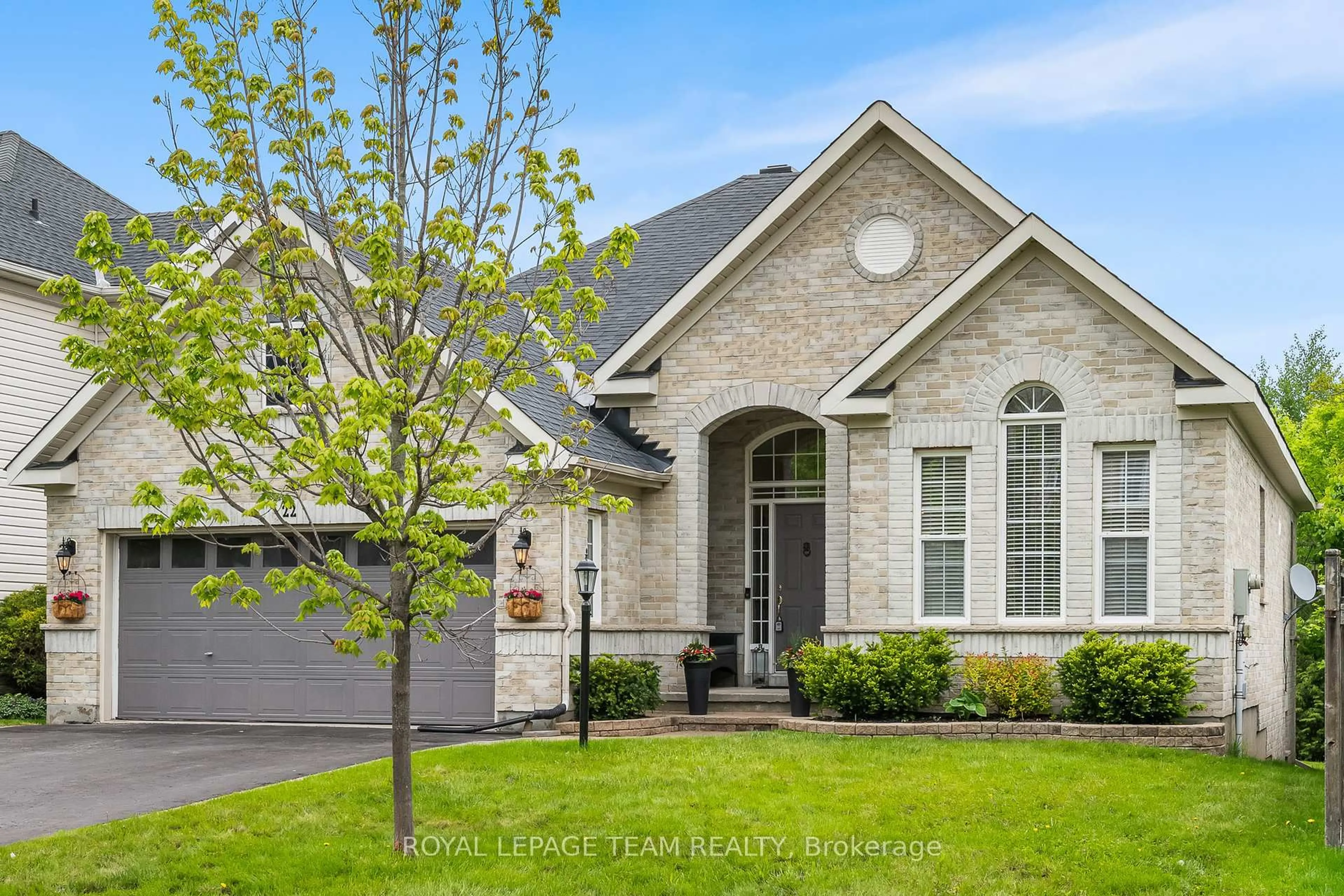 Home with brick exterior material, street for 22 Leatherwood Cres, Ottawa Ontario K2J 4X9