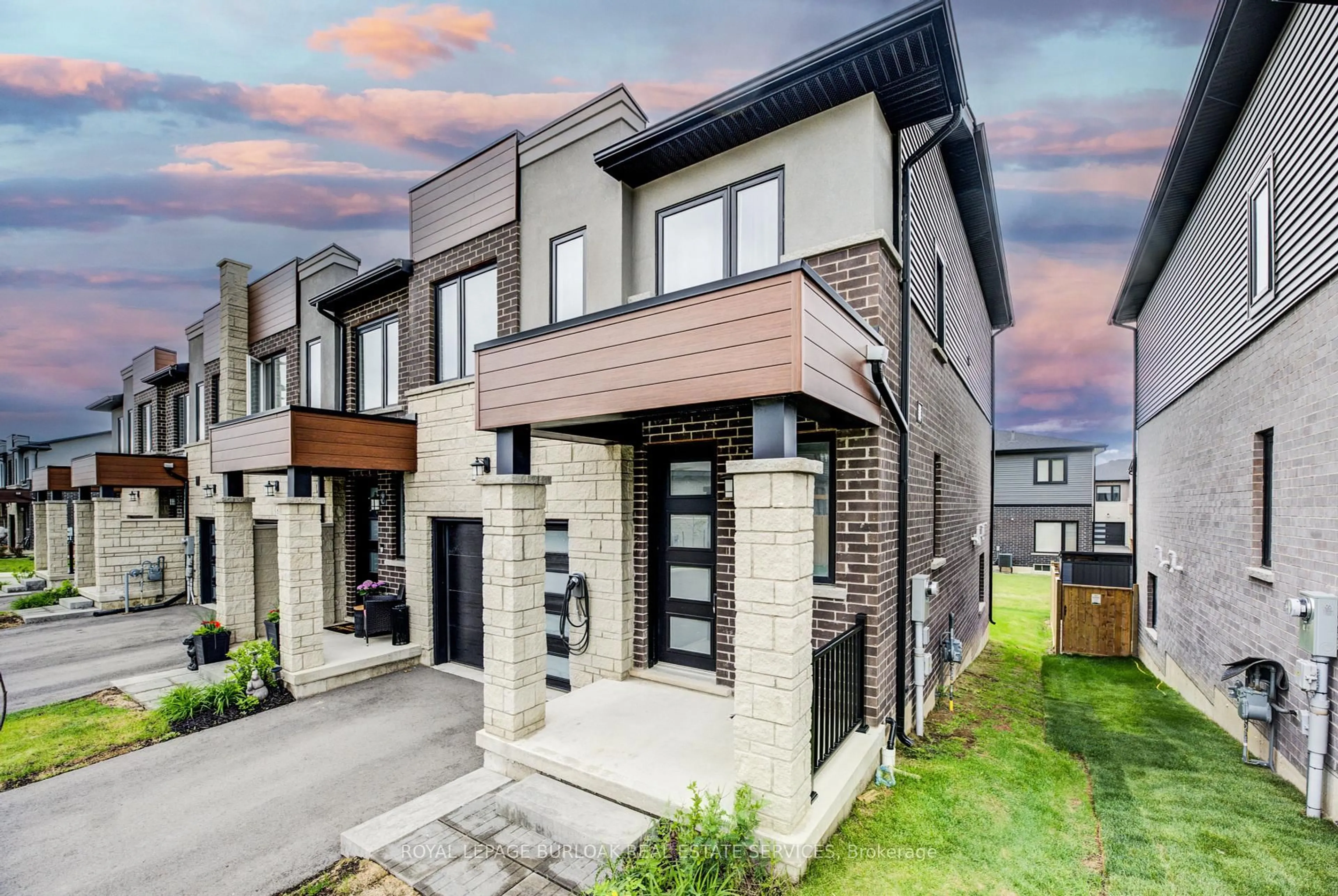 Home with brick exterior material, street for 71 Bensley Lane, Hamilton Ontario L9C 0E9