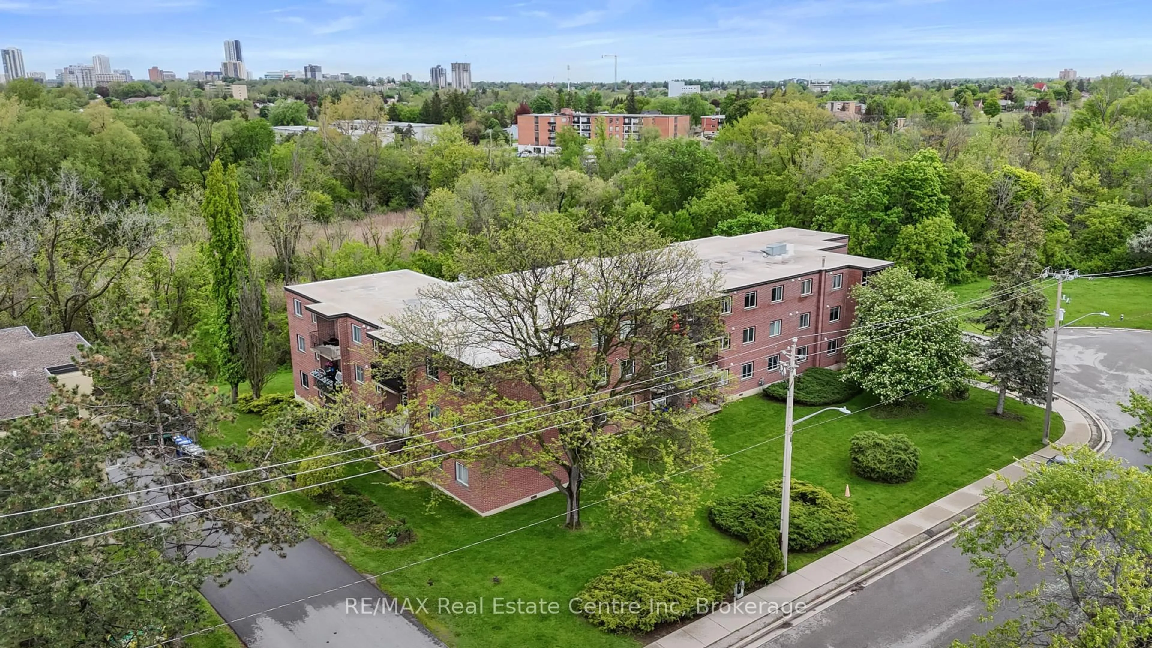 A pic from outside/outdoor area/front of a property/back of a property/a pic from drone, city buildings view from balcony for 4 Avalon Pl #305, Kitchener Ontario N2M 4N6