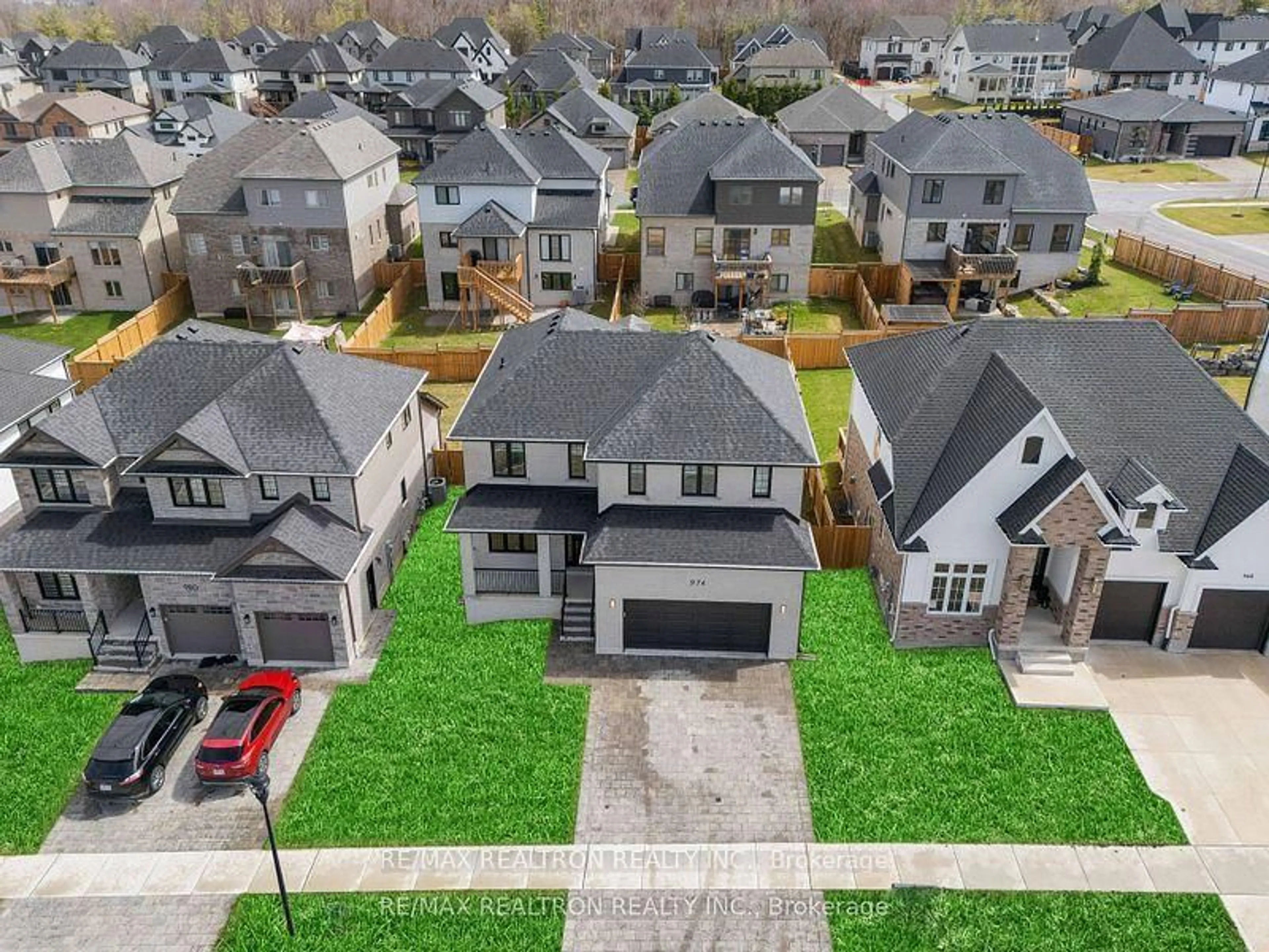 A pic from outside/outdoor area/front of a property/back of a property/a pic from drone, street for 974 Riverbend Rd, London South Ontario N6K 0J3